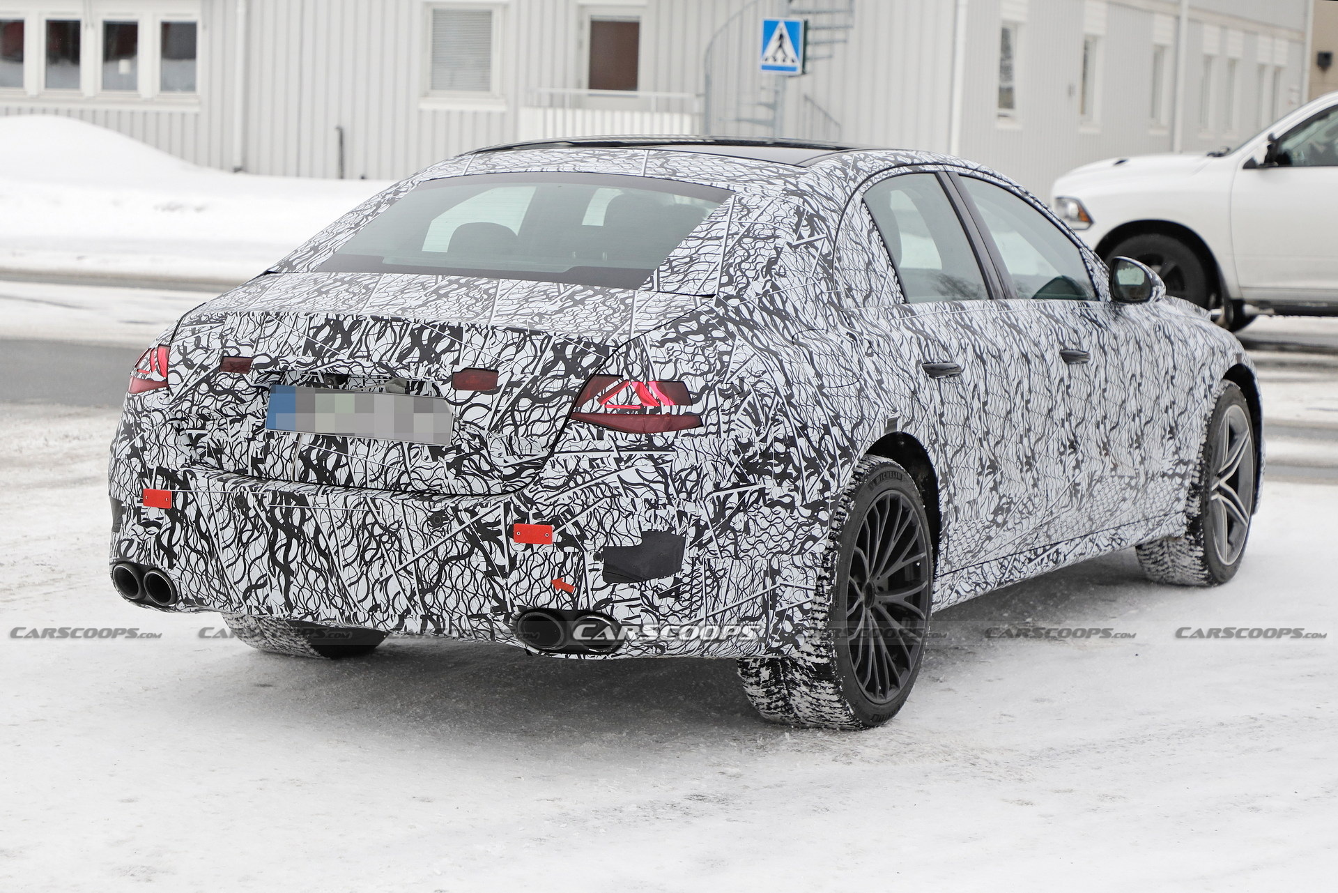 Mercedes-AMG E53e Hybrid Spied With Mismatched Wheels, Quad Tailpipes