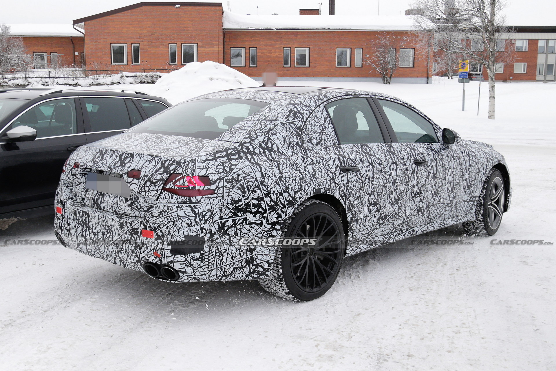 Mercedes-AMG E53e Hybrid Spied With Mismatched Wheels, Quad Tailpipes