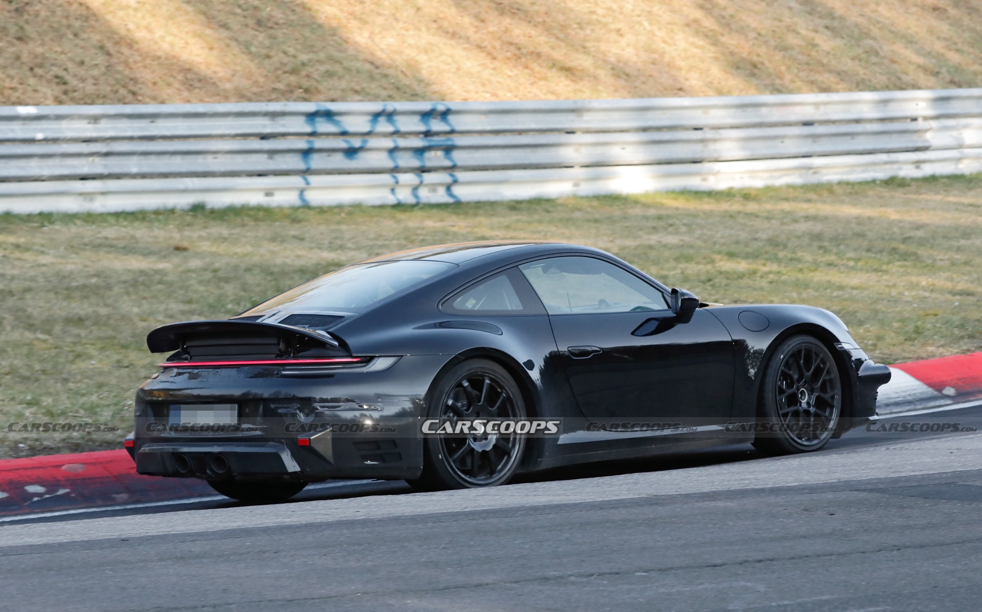 Electrified 2024 Porsche 911 Hybrid Caught Charging Hard At The Nurburgring