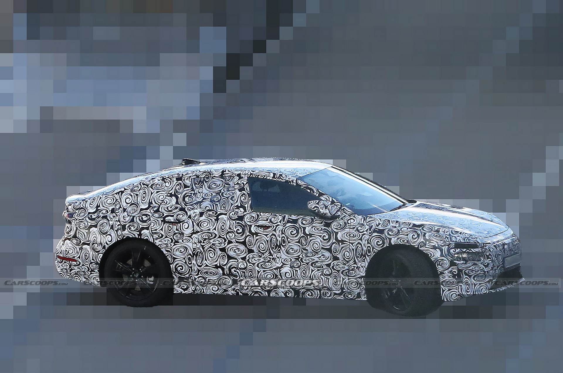 2024 Audi A6 E-Tron Spied Again Showing Split Headlights And Toned-Down Styling