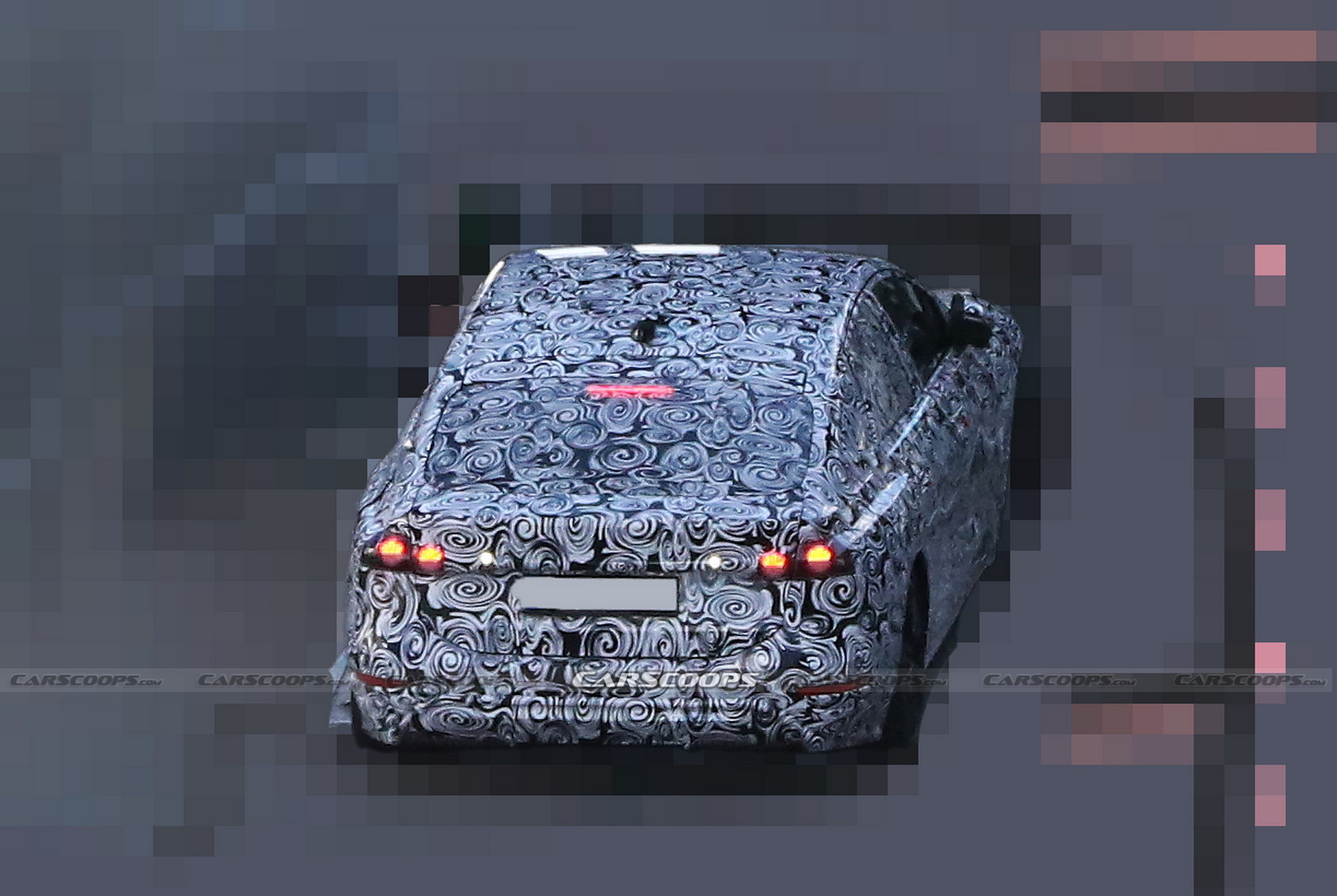 2024 Audi A6 E-Tron Spied Again Showing Split Headlights And Toned-Down Styling