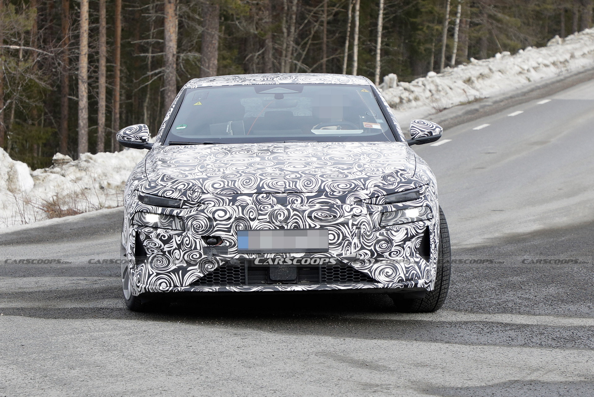 2024 Audi A6 E-Tron Spied Again Showing Split Headlights And Toned-Down Styling