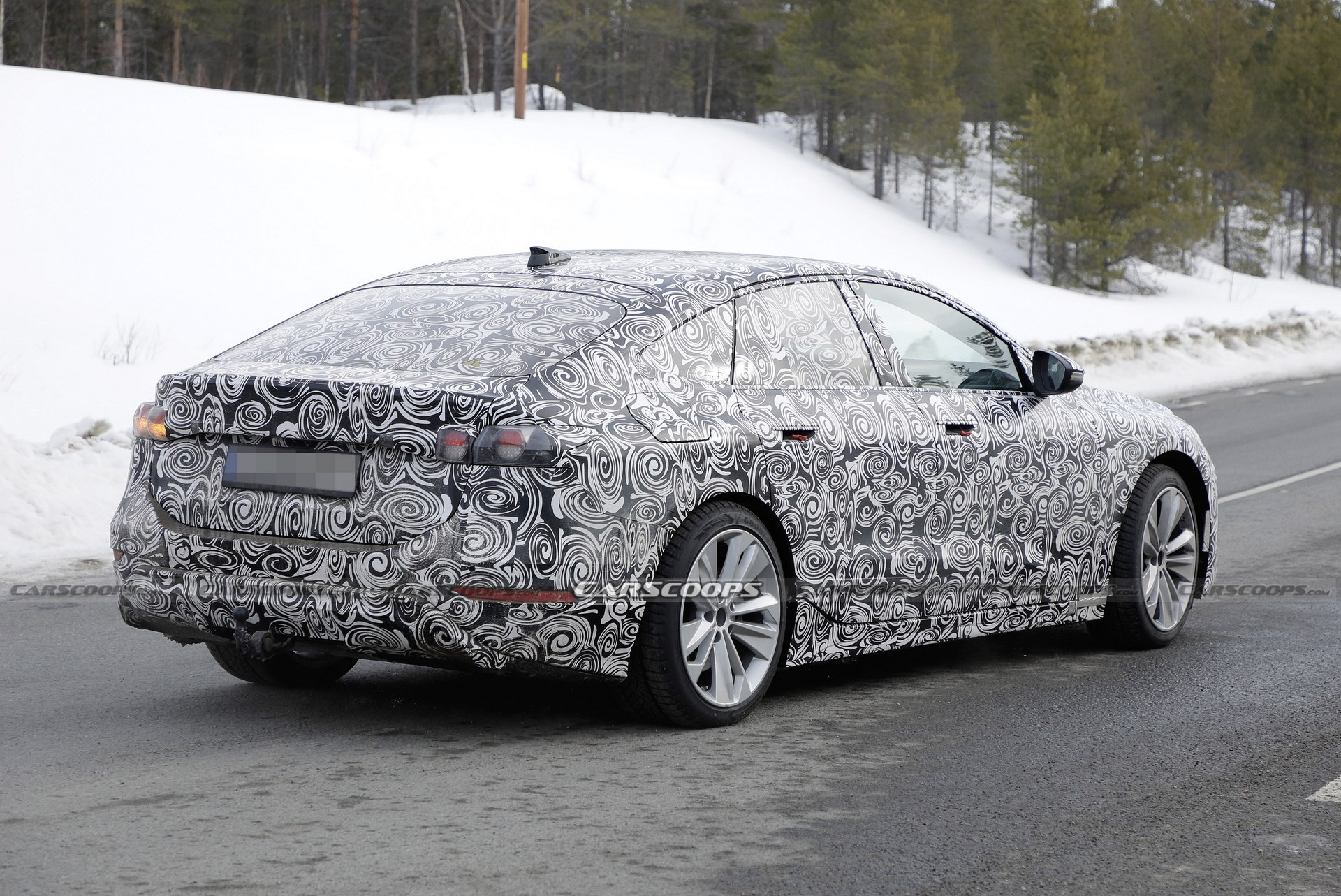 2024 Audi A6 E-Tron Spied Again Showing Split Headlights And Toned-Down Styling