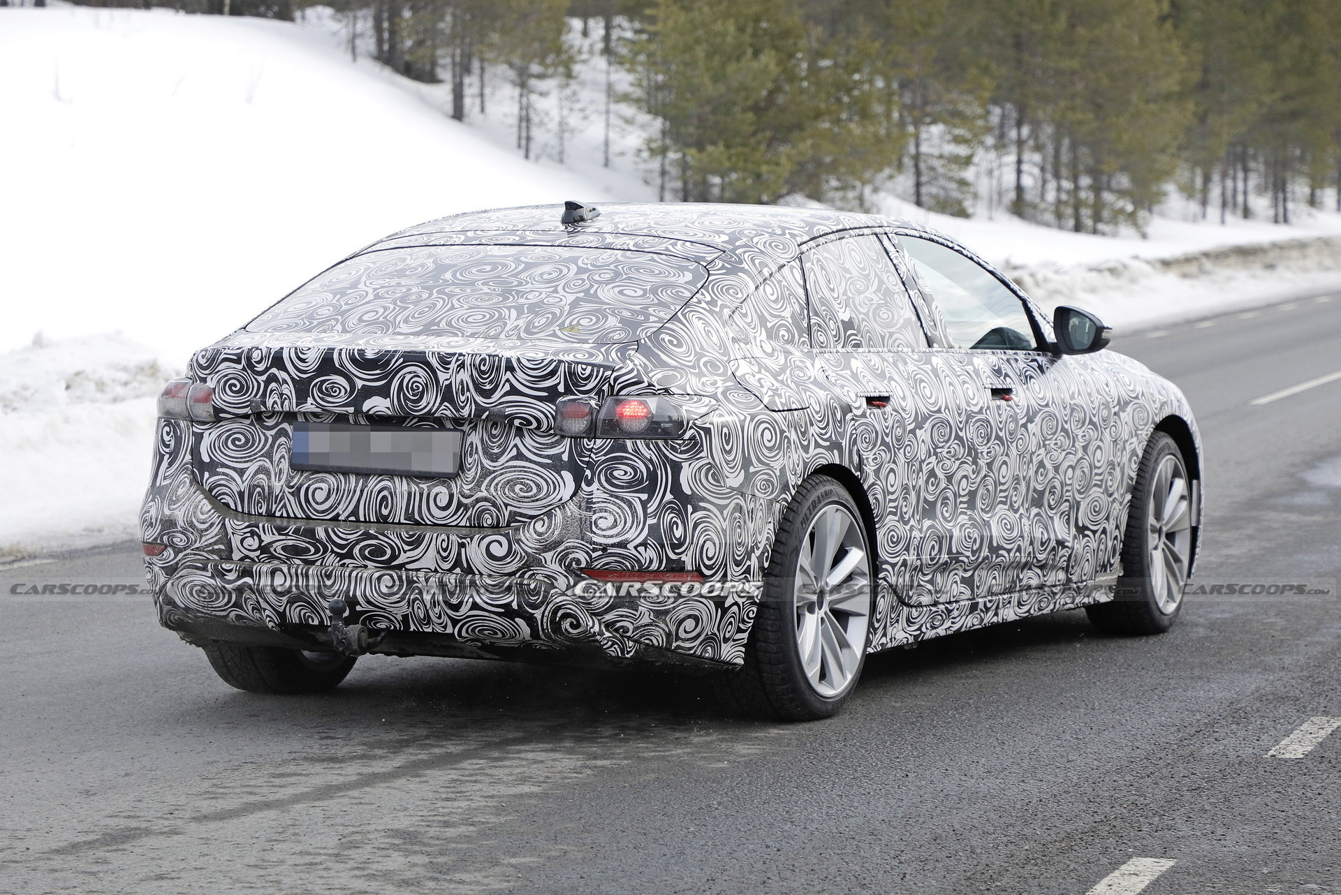2024 Audi A6 E-Tron Spied Again Showing Split Headlights And Toned-Down Styling