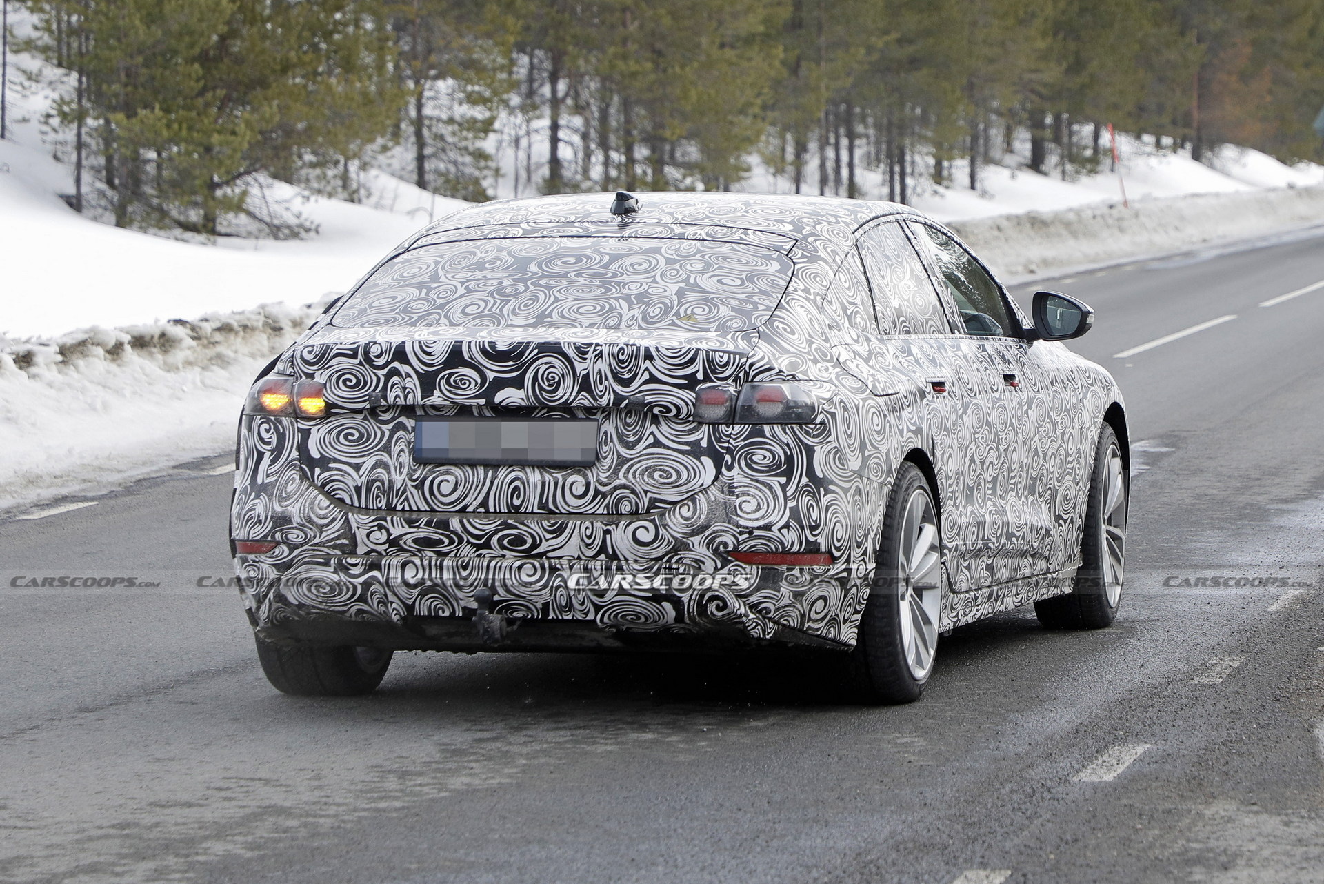 2024 Audi A6 E-Tron Spied Again Showing Split Headlights And Toned-Down Styling