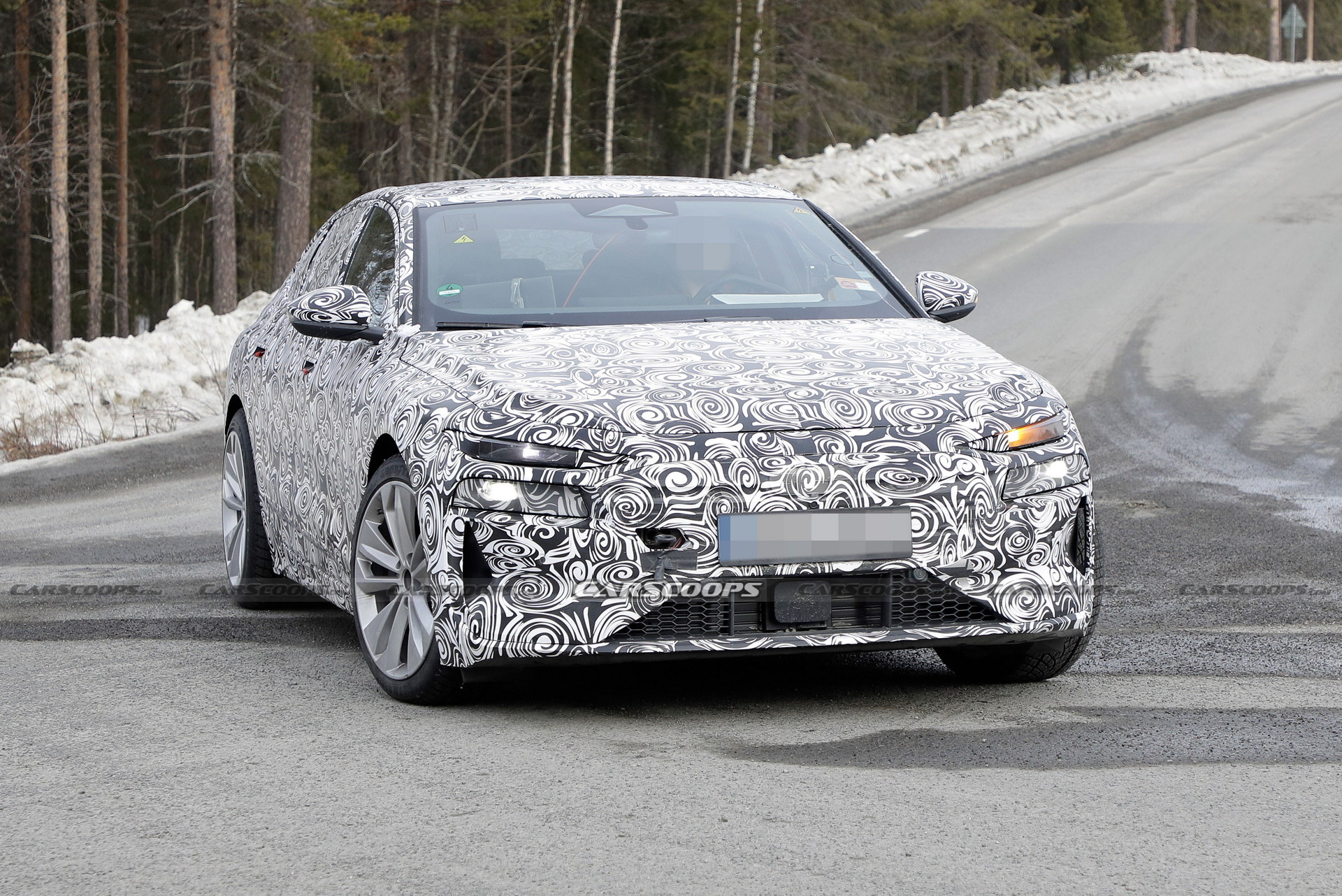 2024 Audi A6 E-Tron Spied Again Showing Split Headlights And Toned-Down Styling