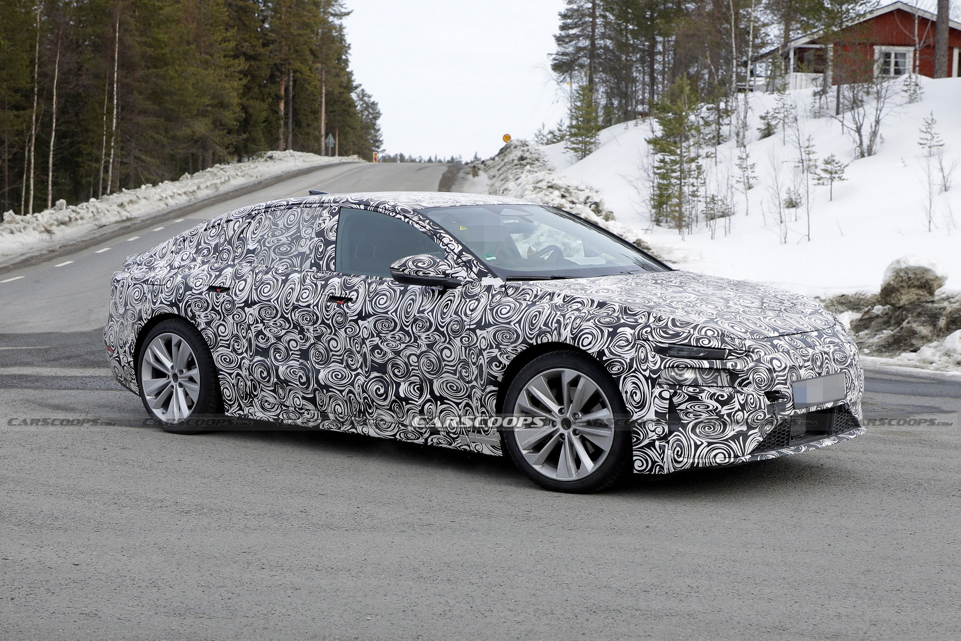 2024 Audi A6 E-Tron Spied Again Showing Split Headlights And Toned-Down Styling