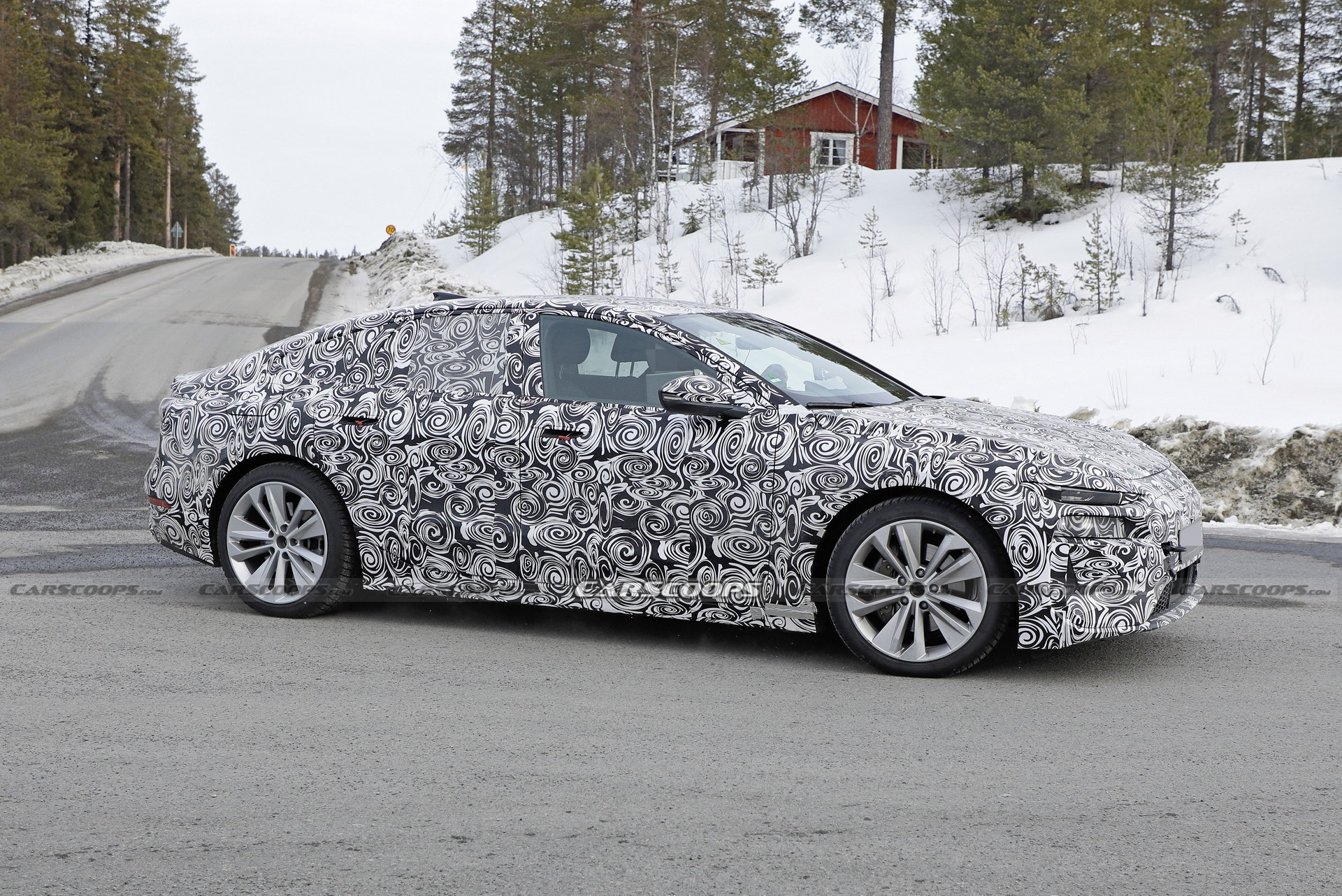 2024 Audi A6 E-Tron Spied Again Showing Split Headlights And Toned-Down Styling