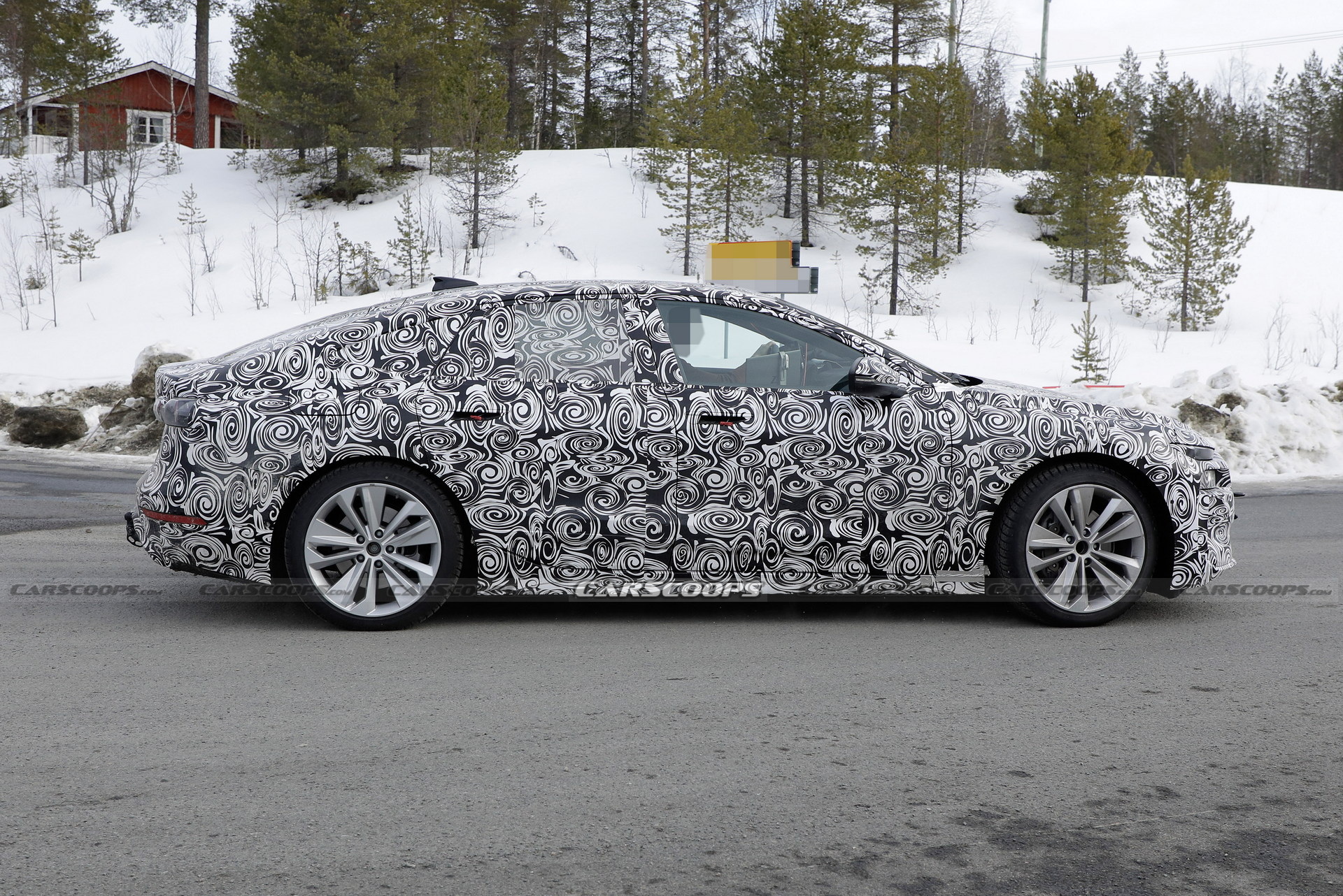 2024 Audi A6 E-Tron Spied Again Showing Split Headlights And Toned-Down Styling