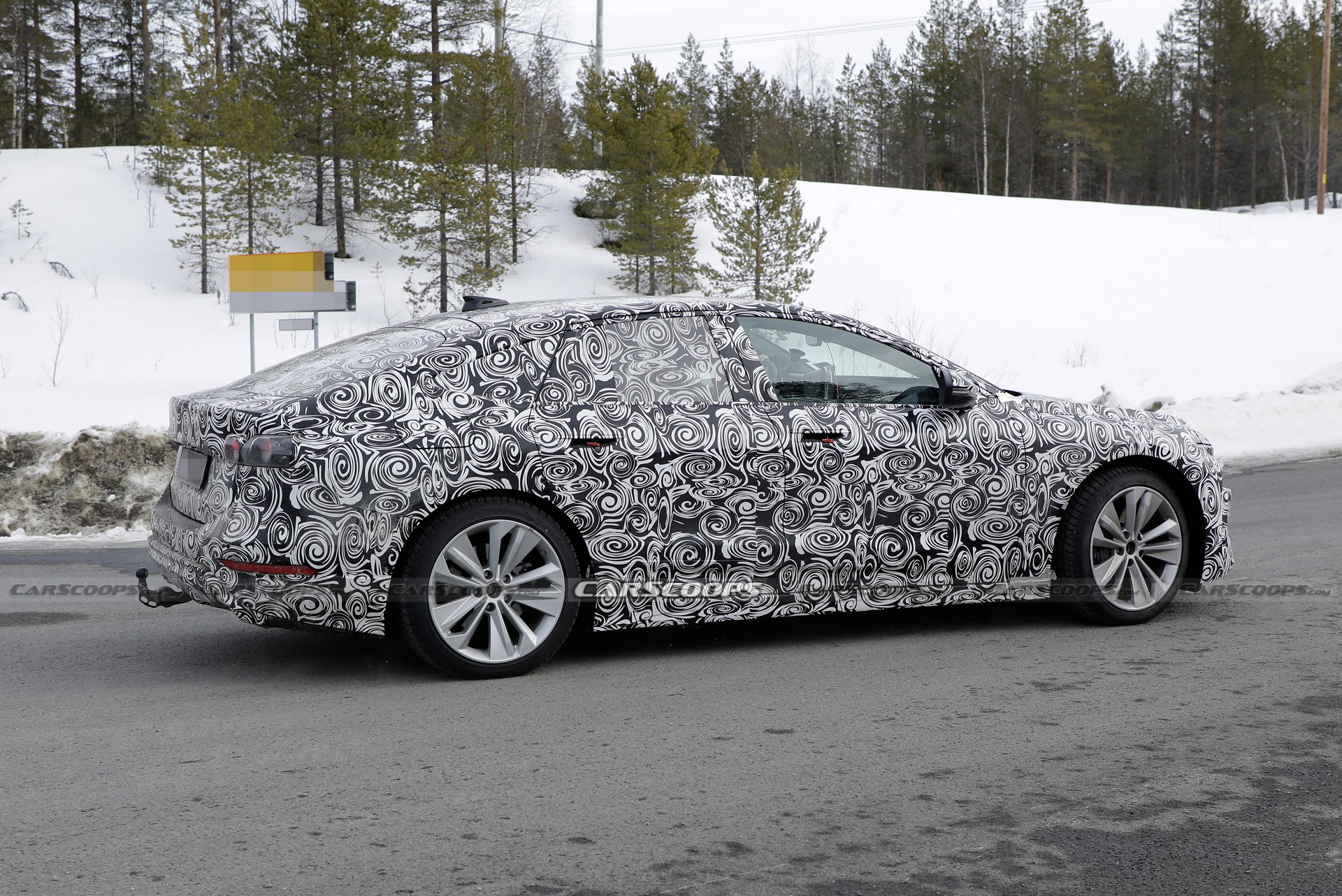 2024 Audi A6 E-Tron Spied Again Showing Split Headlights And Toned-Down Styling