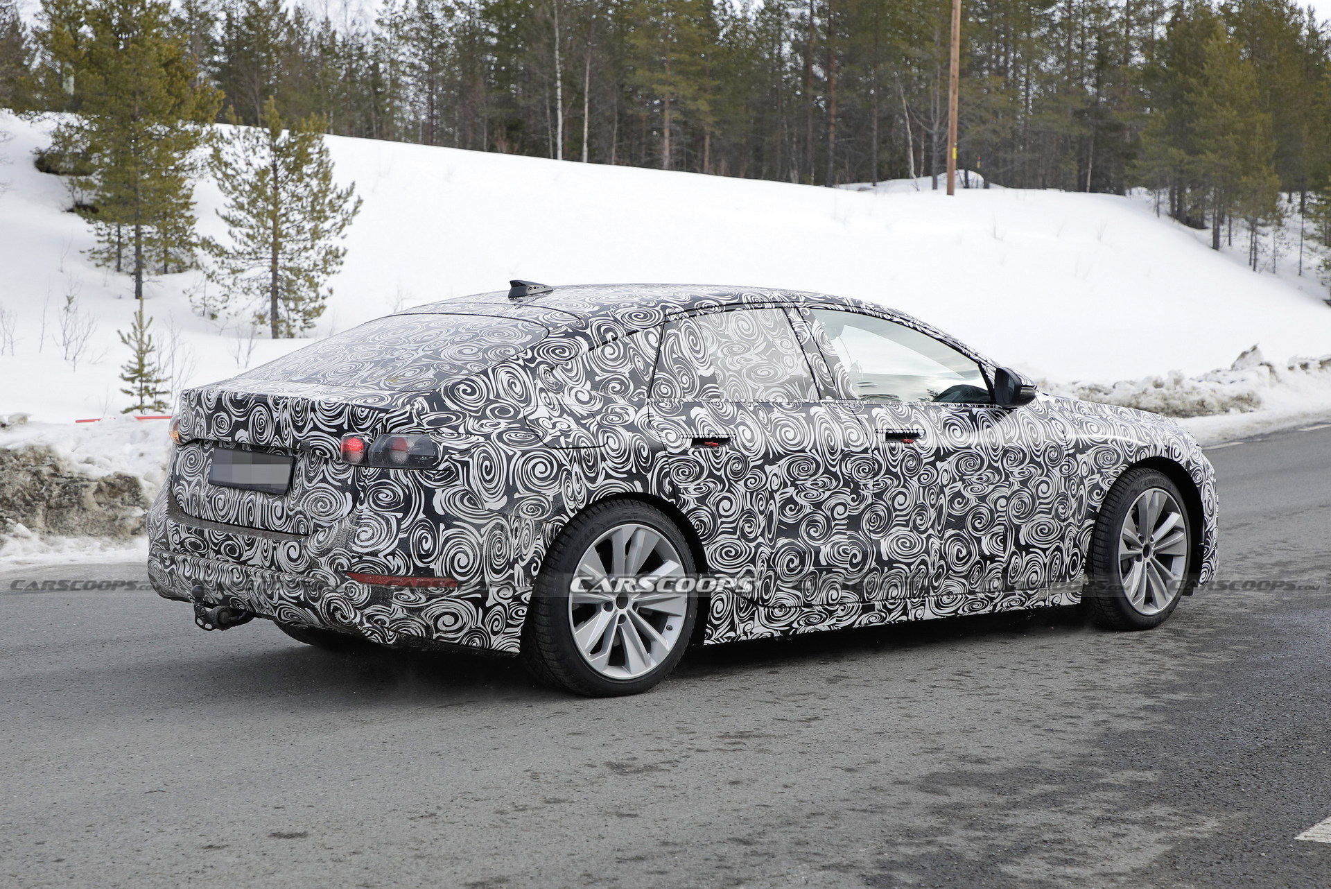 2024 Audi A6 E-Tron Spied Again Showing Split Headlights And Toned-Down Styling