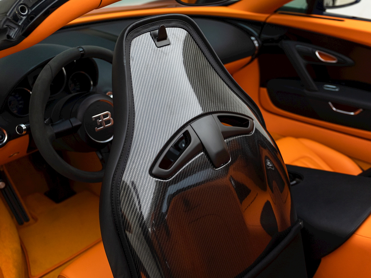 Bugatti Veyron Grand Sport Vitesse Looks Dapper In Dark Blue Carbon Fiber