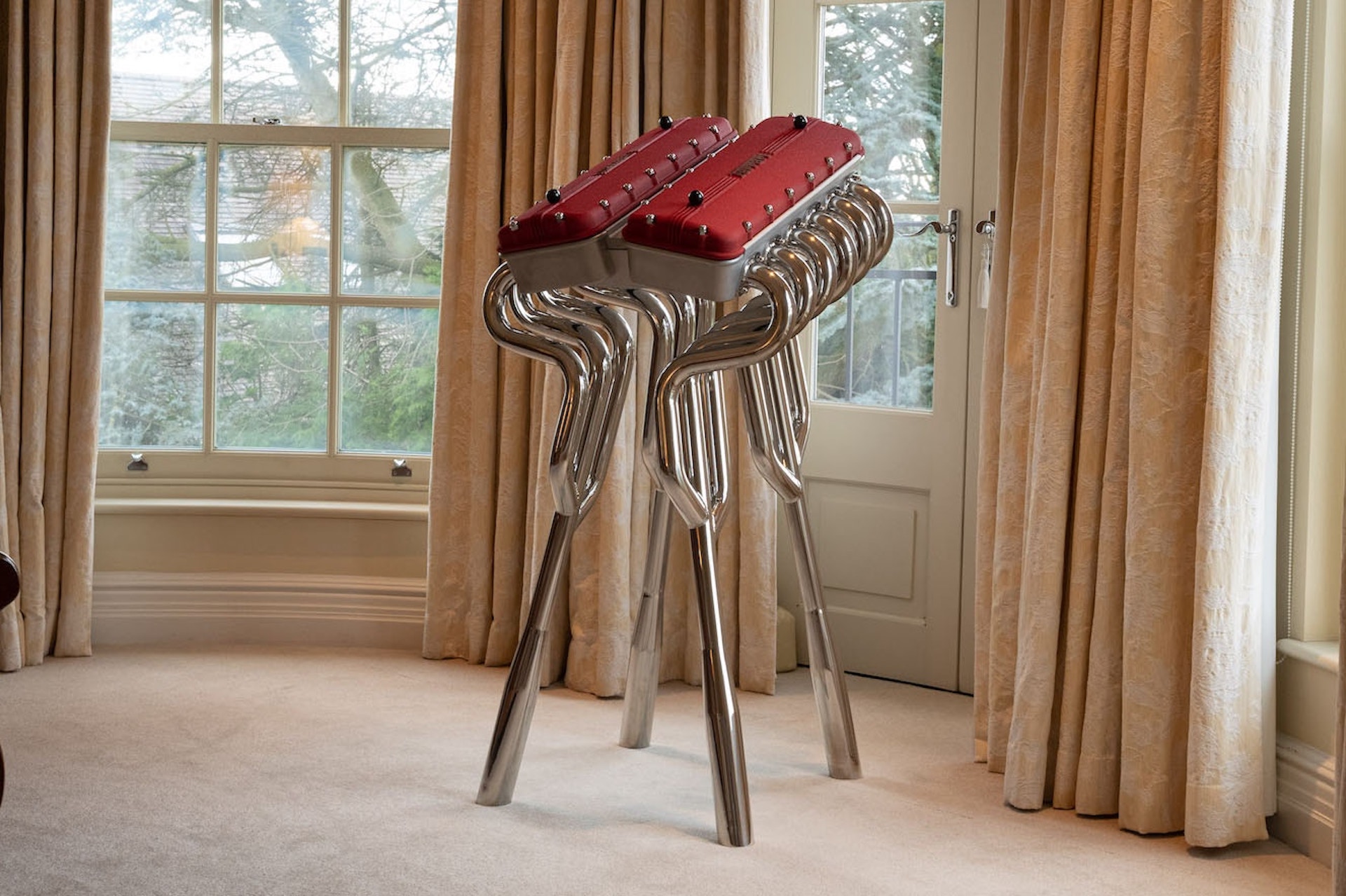 This $30,000 Ferrari Book Comes With A Stand Made From Fake Rocker Covers And Exhaust Headers