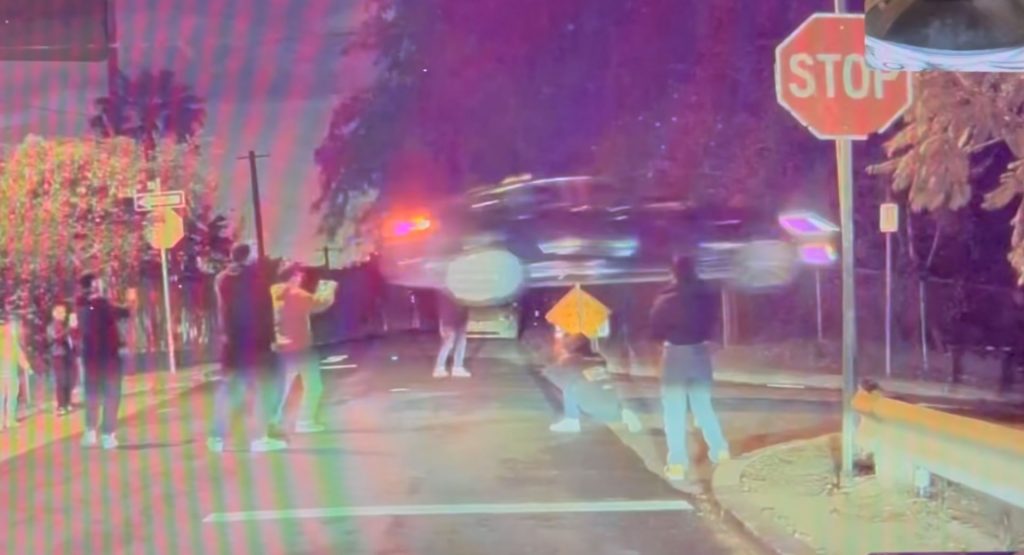  LAPD Names Influencer Who Claims He’s Responsible For Viral Tesla Crash As Person Of Interest