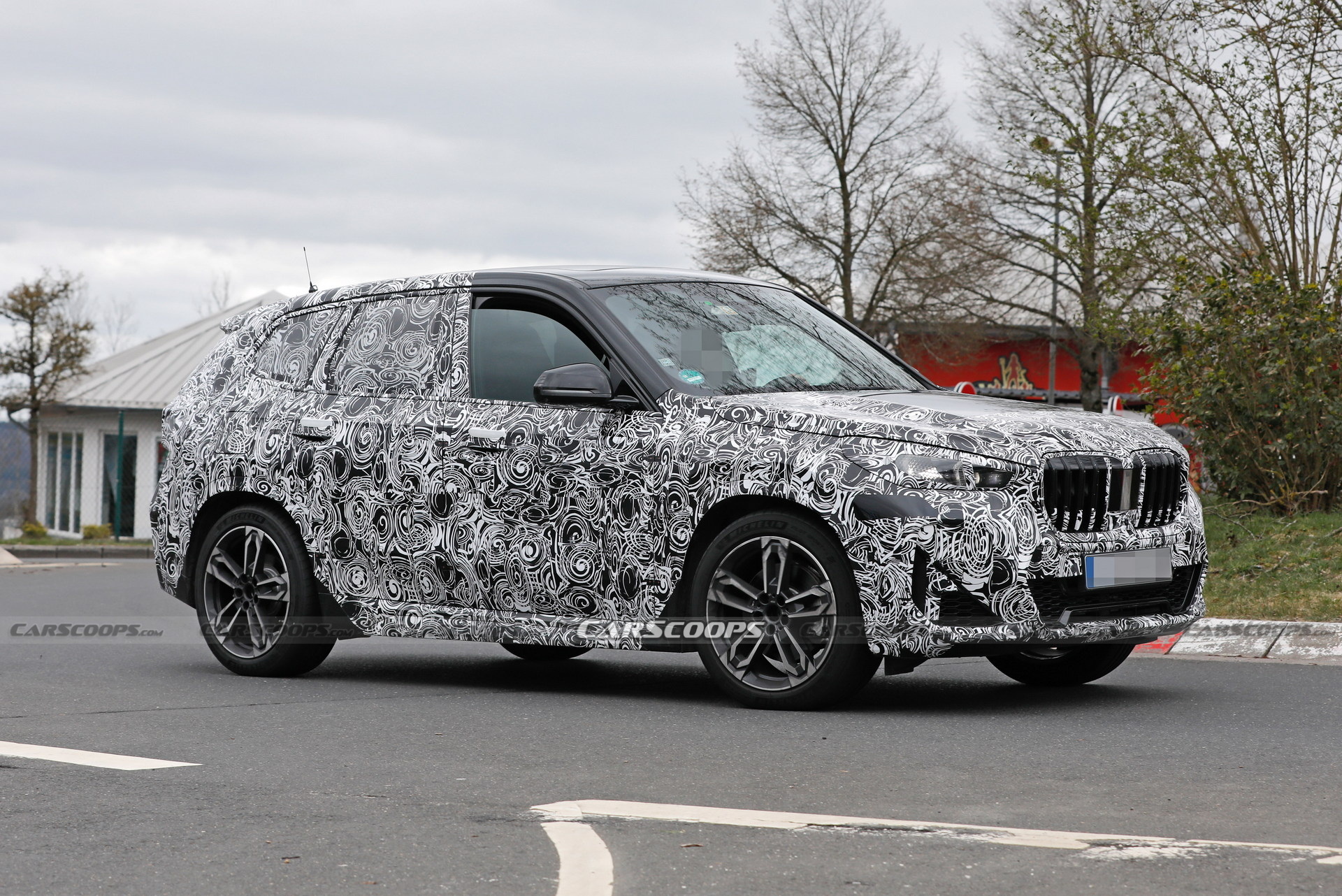 2023 BMW X1 Spied With Less Camouflage Revealing X2-Inspired Bumper