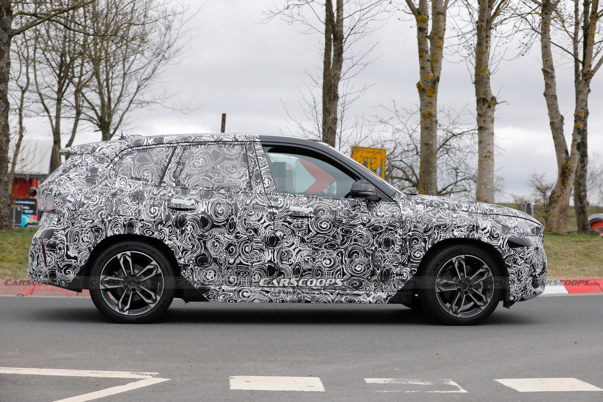2023 BMW X1 Spied With Less Camouflage Revealing X2-Inspired Bumper