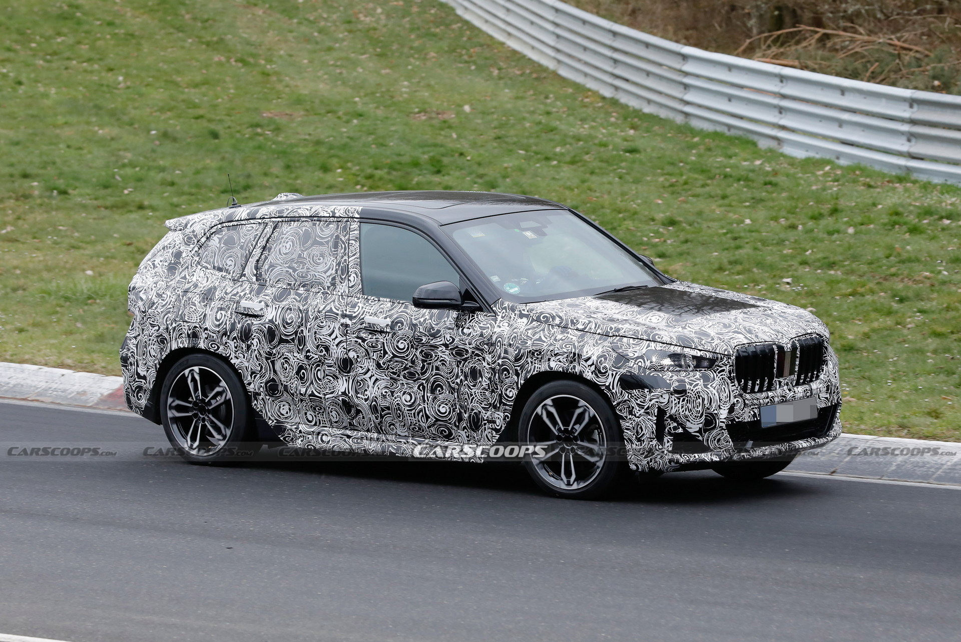 2023 BMW X1 Spied With Less Camouflage Revealing X2-Inspired Bumper