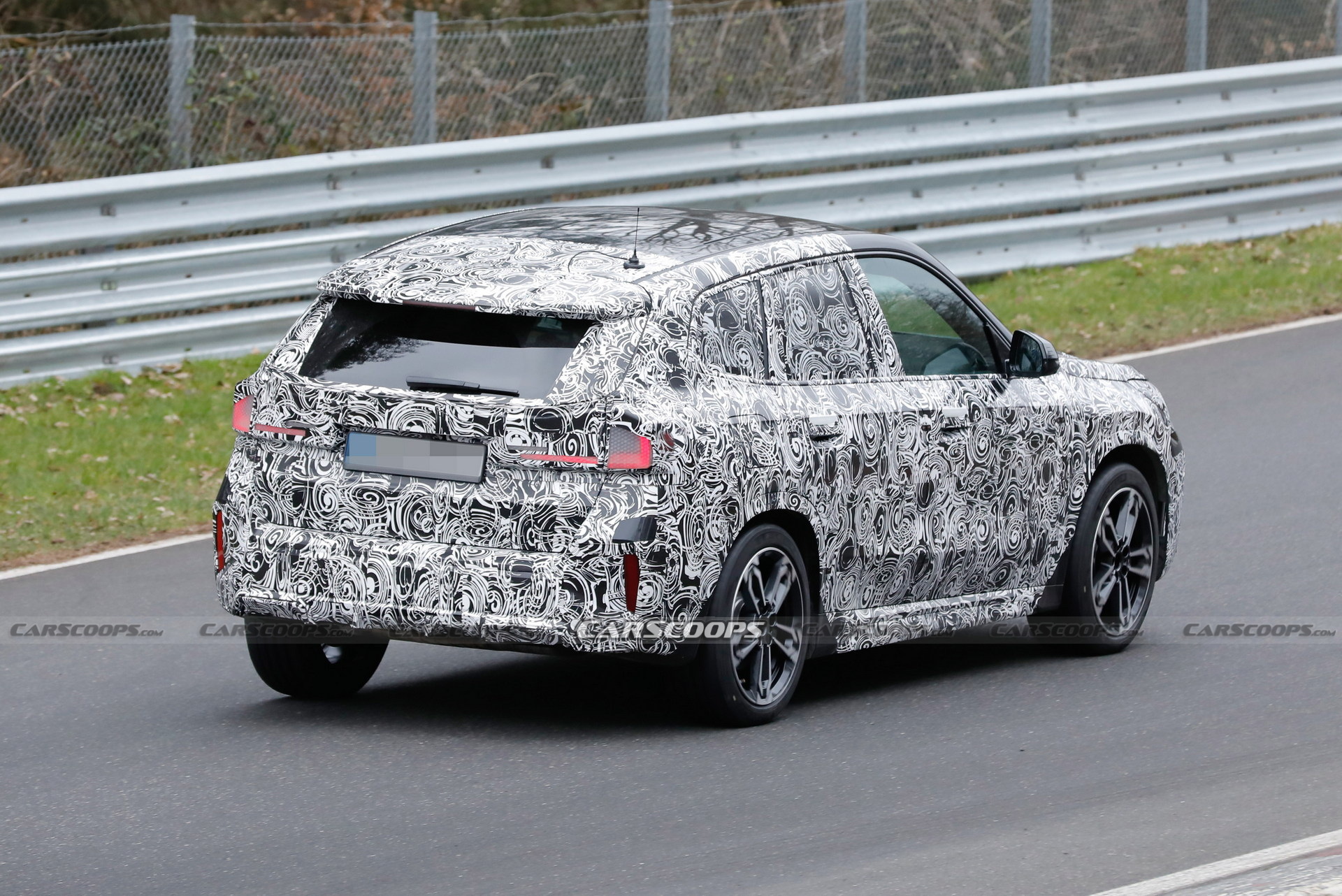 2023 BMW X1 Spied With Less Camouflage Revealing X2-Inspired Bumper