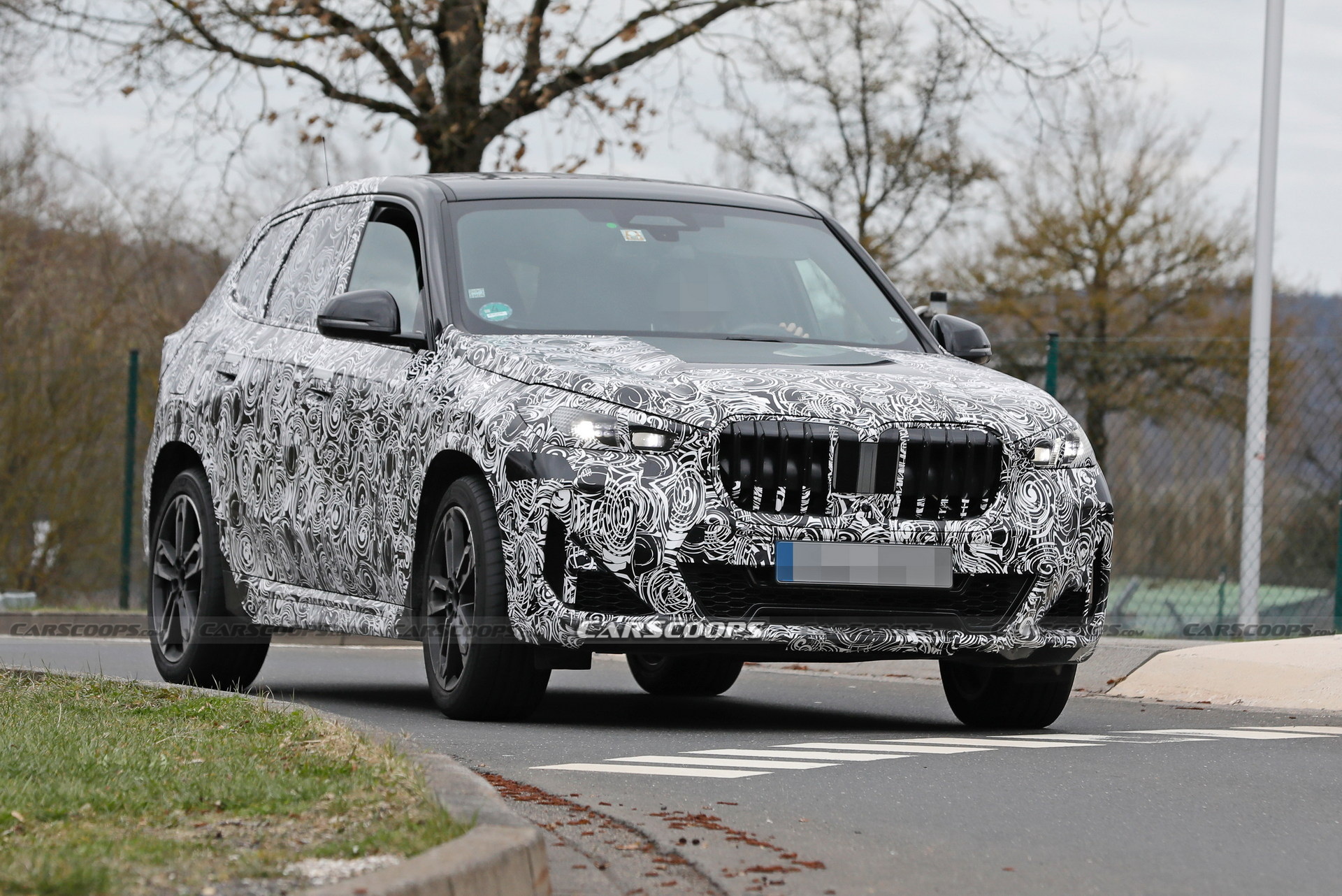 2023 BMW X1 Spied With Less Camouflage Revealing X2-Inspired Bumper