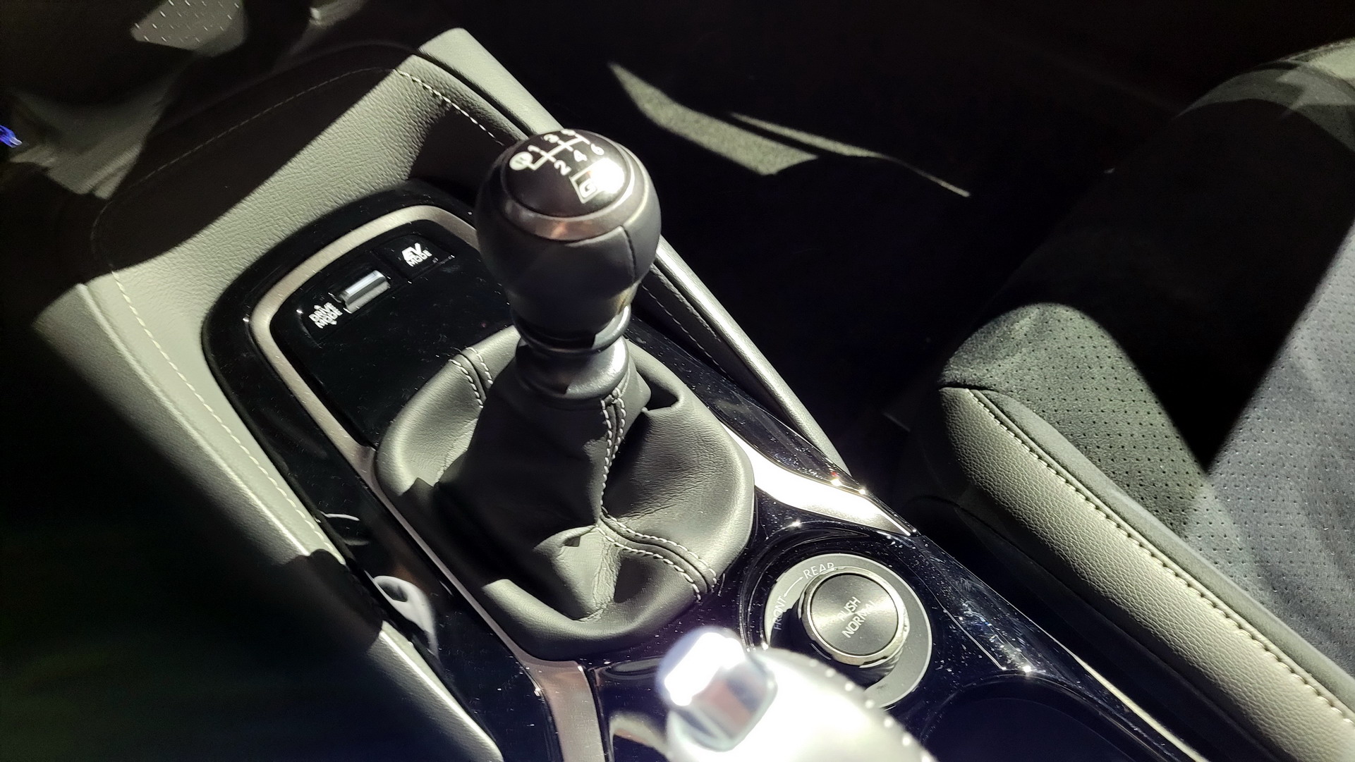 Why Did Toyota’s GR Corolla Launch Cars Have An EV Button And Analog Stock Gauges?