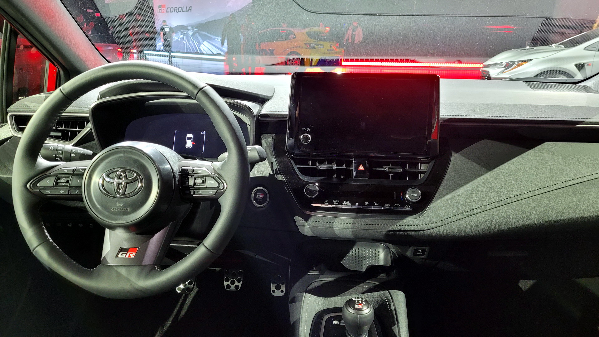 Why Did Toyota’s GR Corolla Launch Cars Have An EV Button And Analog Stock Gauges?