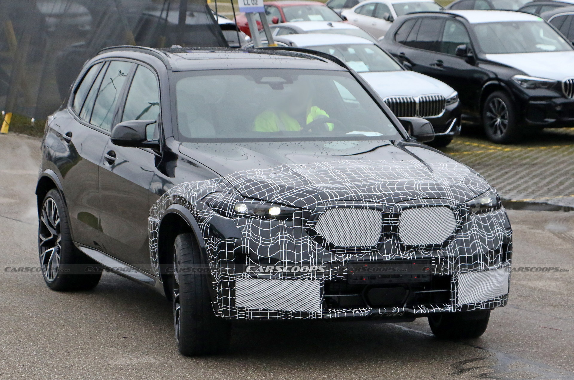 2024 BMW X5M Adds Redesigned Taillights Into The Mix, Shows More Of Its Face