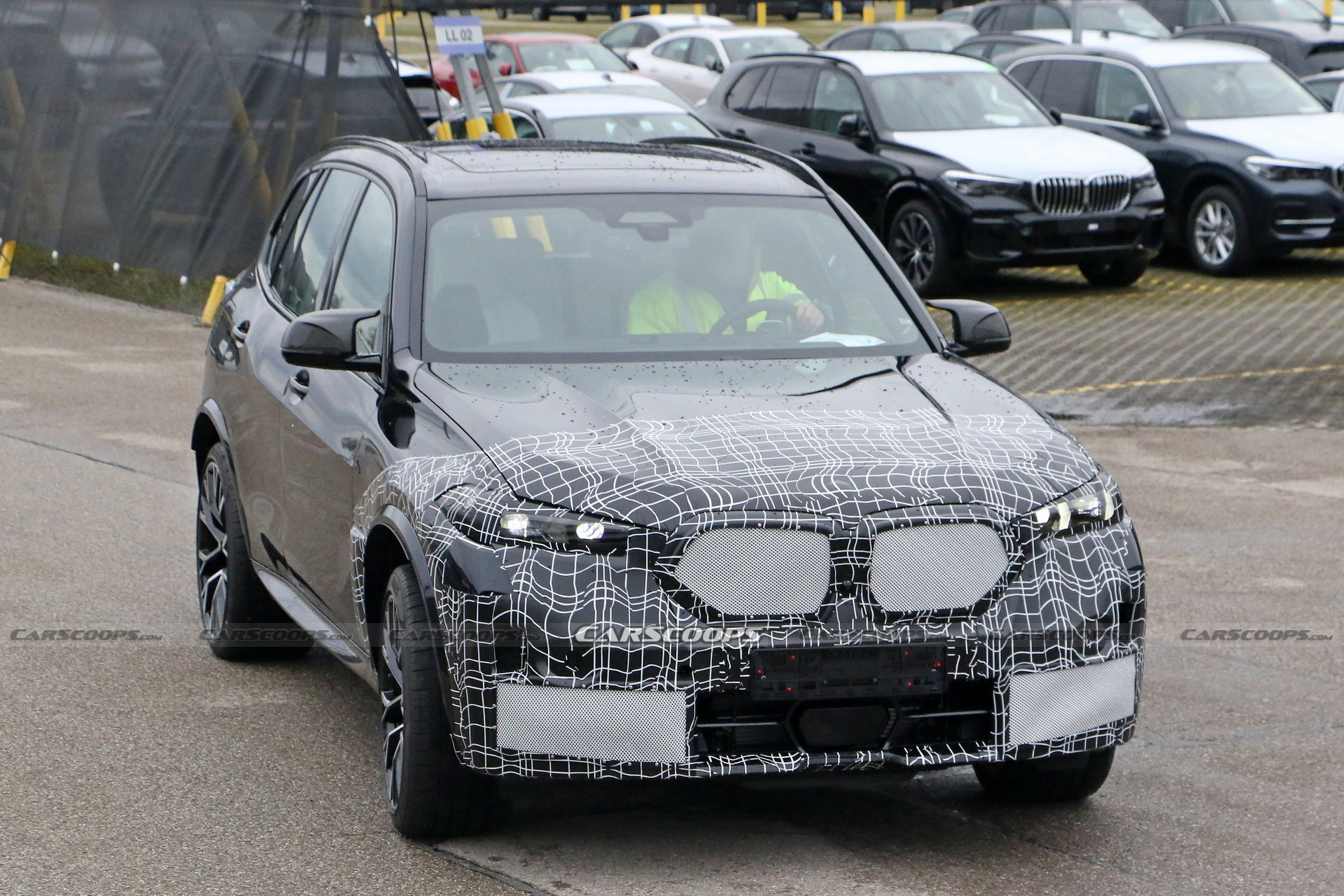 2024 BMW X5M Adds Redesigned Taillights Into The Mix, Shows More Of Its Face