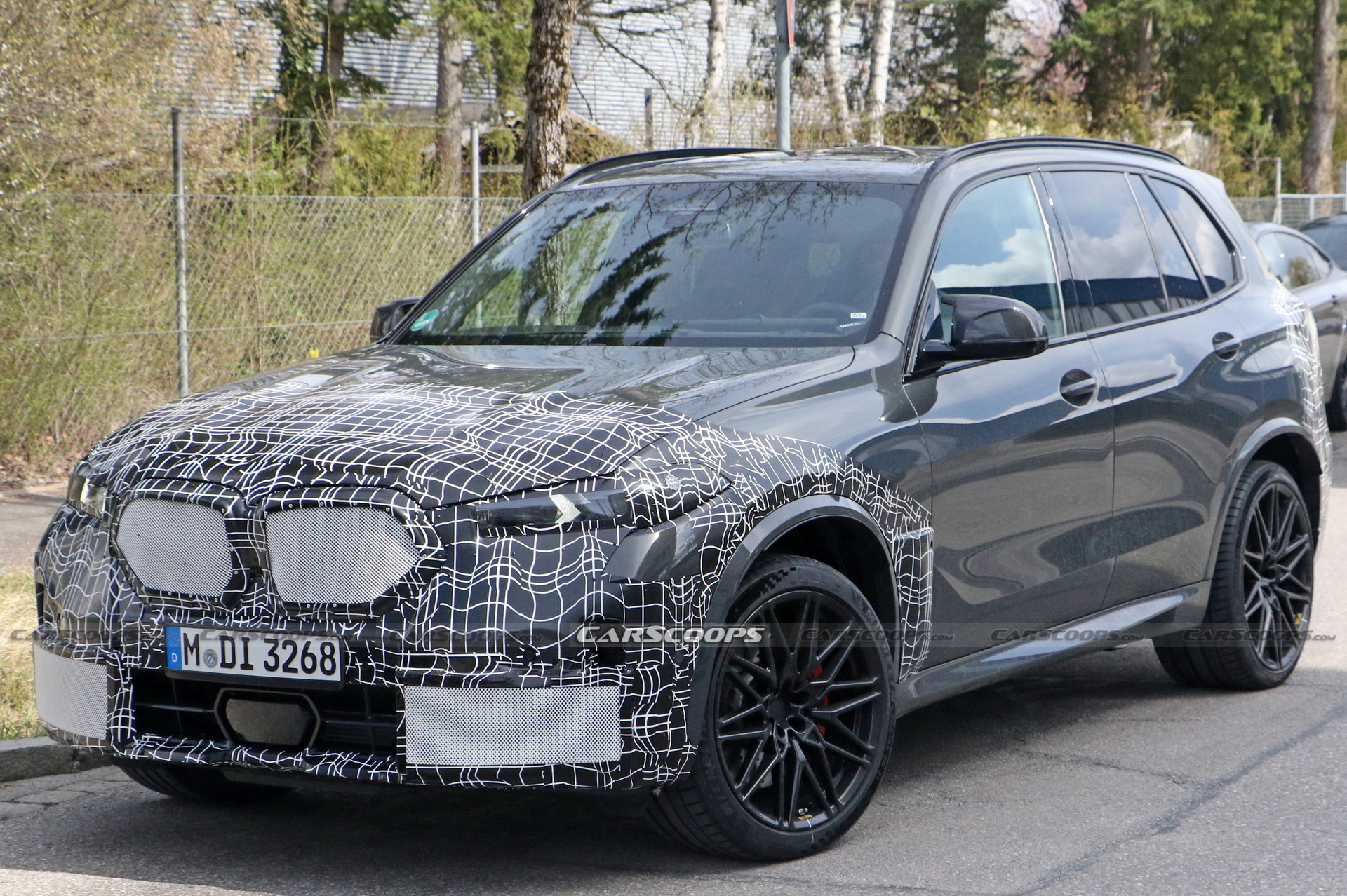 2024 BMW X5M Adds Redesigned Taillights Into The Mix, Shows More Of Its Face