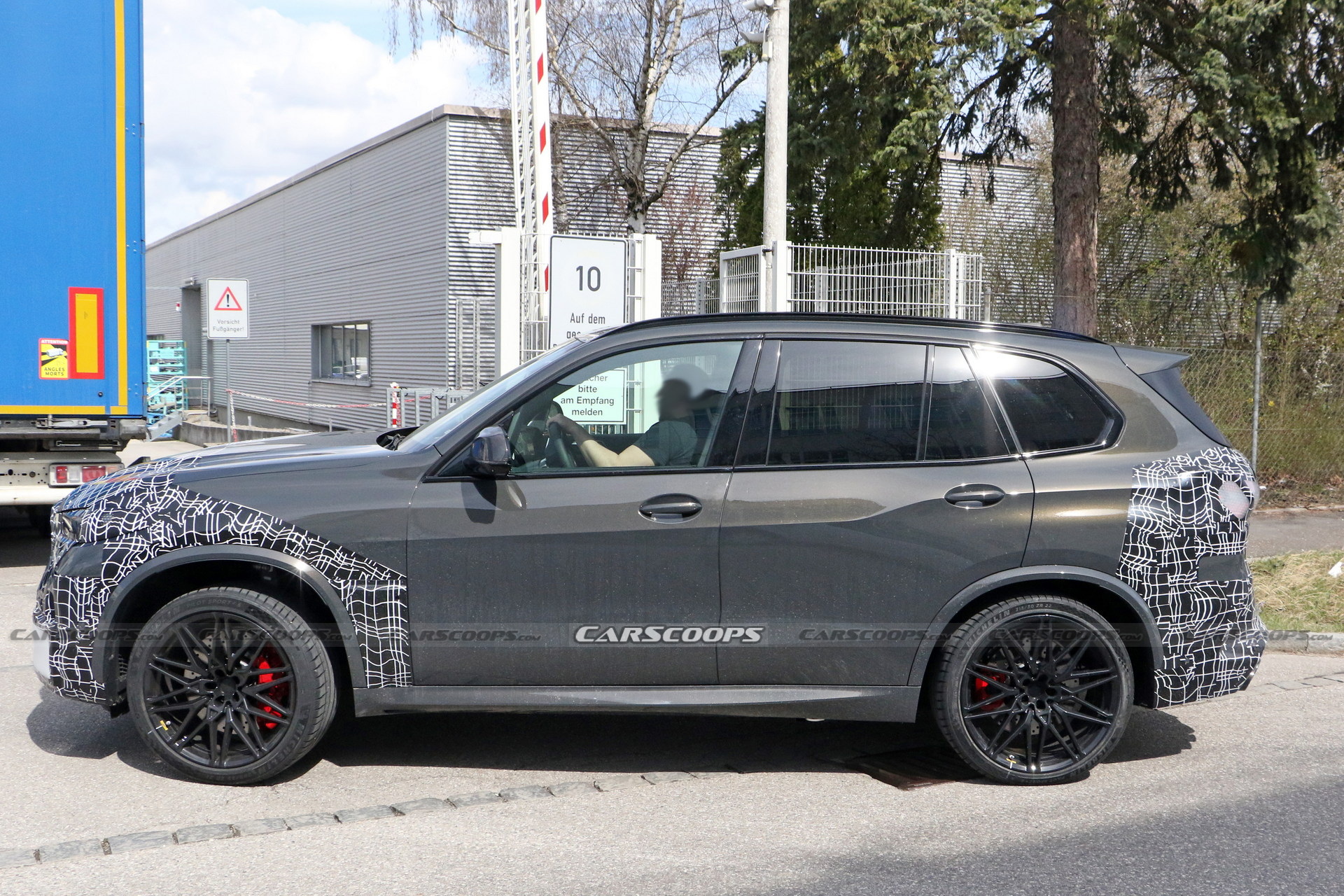 2024 BMW X5M Adds Redesigned Taillights Into The Mix, Shows More Of Its Face