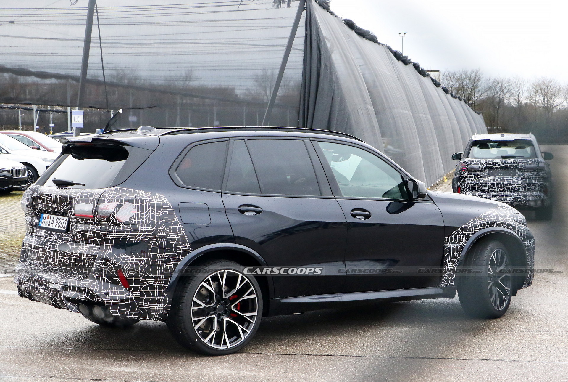 2024 BMW X5M Adds Redesigned Taillights Into The Mix, Shows More Of Its Face