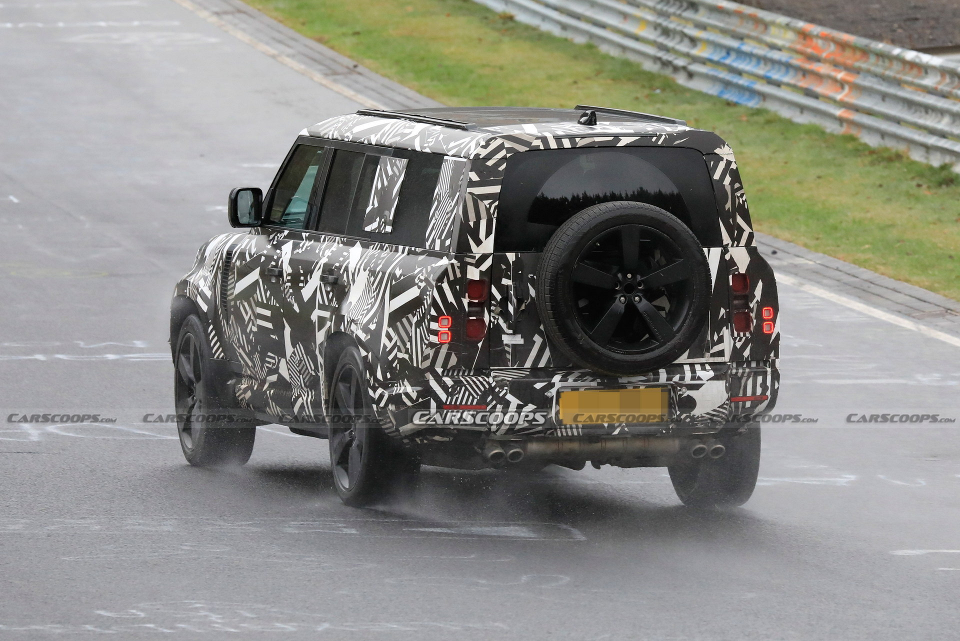 XL-Sized 2023 Land Rover Defender 130 Spied With V8 Engine And Quad Exhaust Pipes