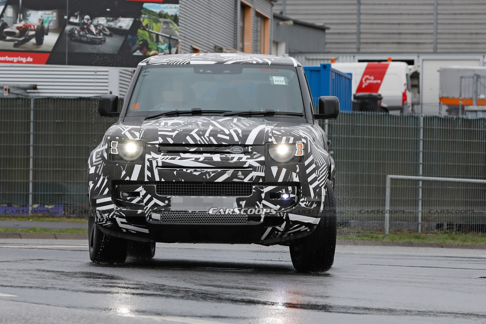 XL-Sized 2023 Land Rover Defender 130 Spied With V8 Engine And Quad Exhaust Pipes