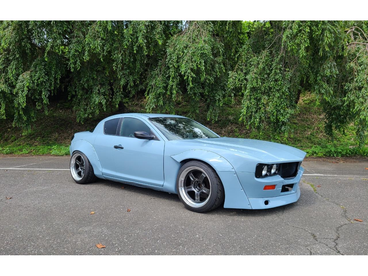 Mazda RX-8 Gets A Reverse Restomod With A ’70s Savannah RX-3 Facelift