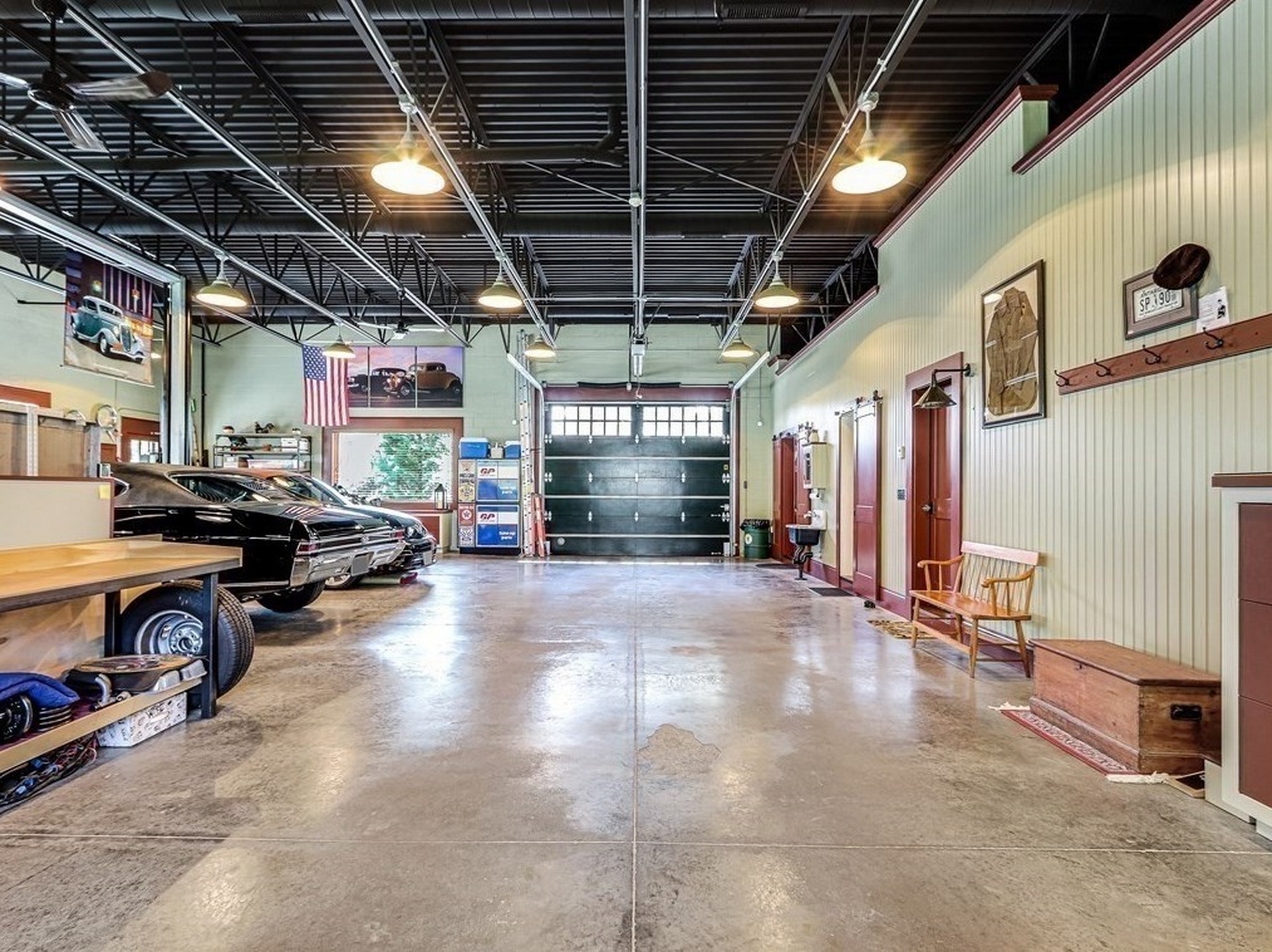 $1.45M Home Modeled After A 1930s Garage With A 2,000 Sq Ft Garage Is A Gearhead’s Dream House