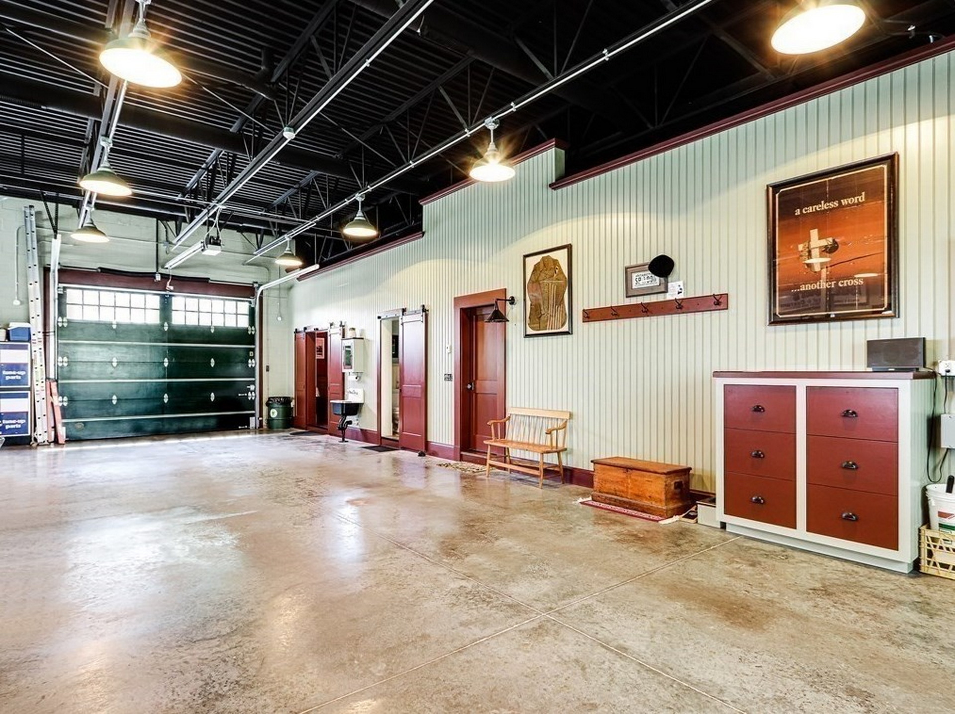 $1.45M Home Modeled After A 1930s Garage With A 2,000 Sq Ft Garage Is A Gearhead’s Dream House