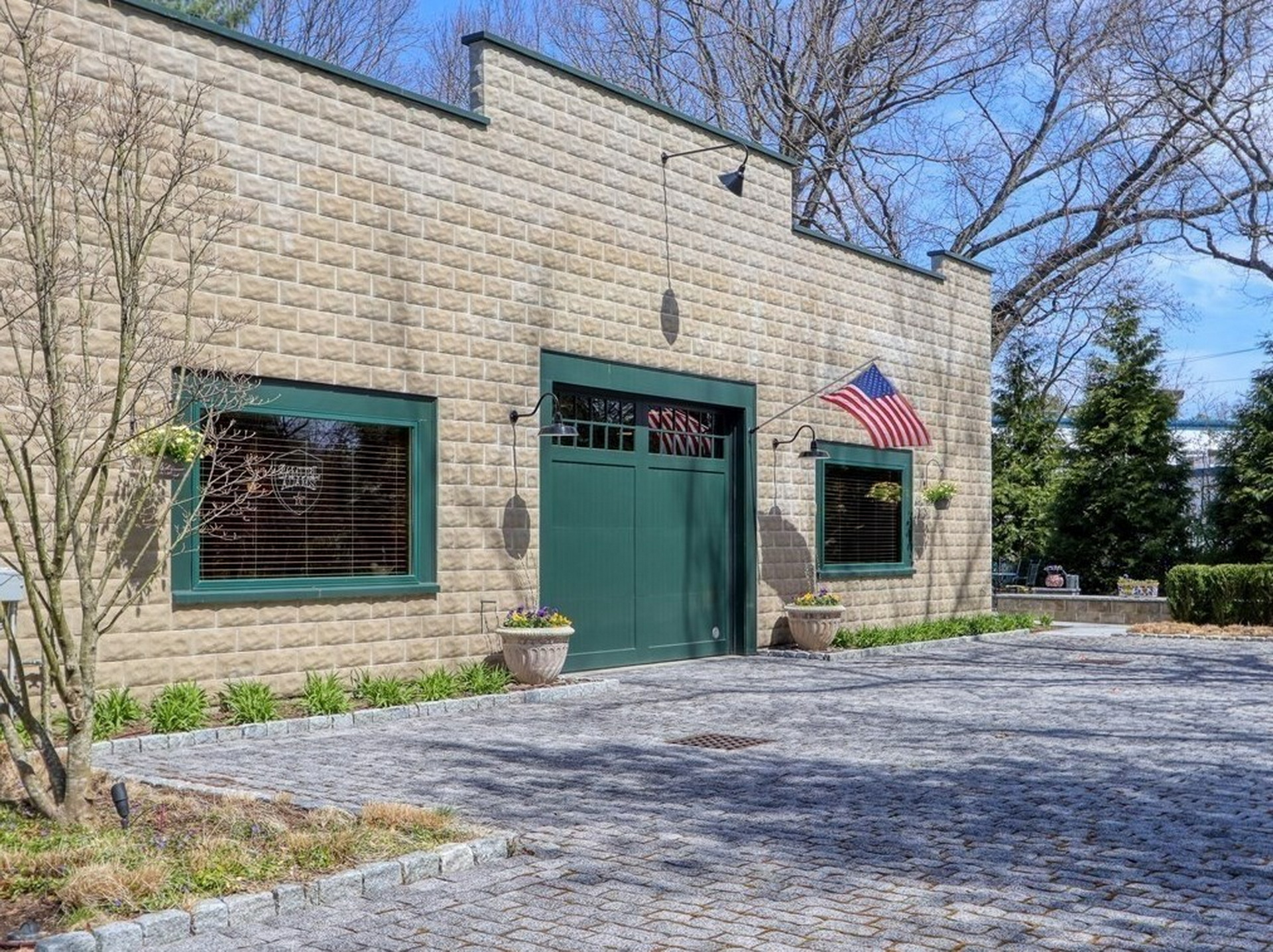 $1.45M Home Modeled After A 1930s Garage With A 2,000 Sq Ft Garage Is A Gearhead’s Dream House