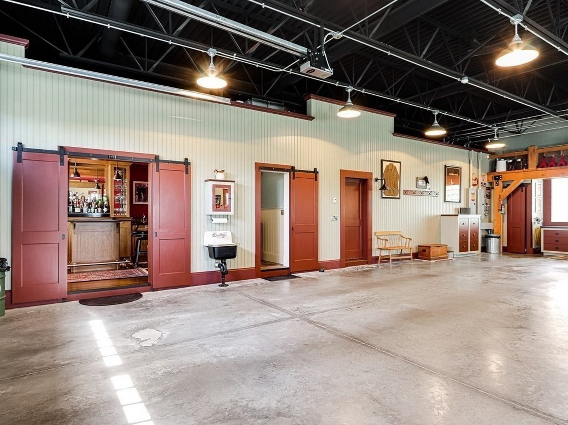 $1.45M Home Modeled After A 1930s Garage With A 2,000 Sq Ft Garage Is A Gearhead’s Dream House