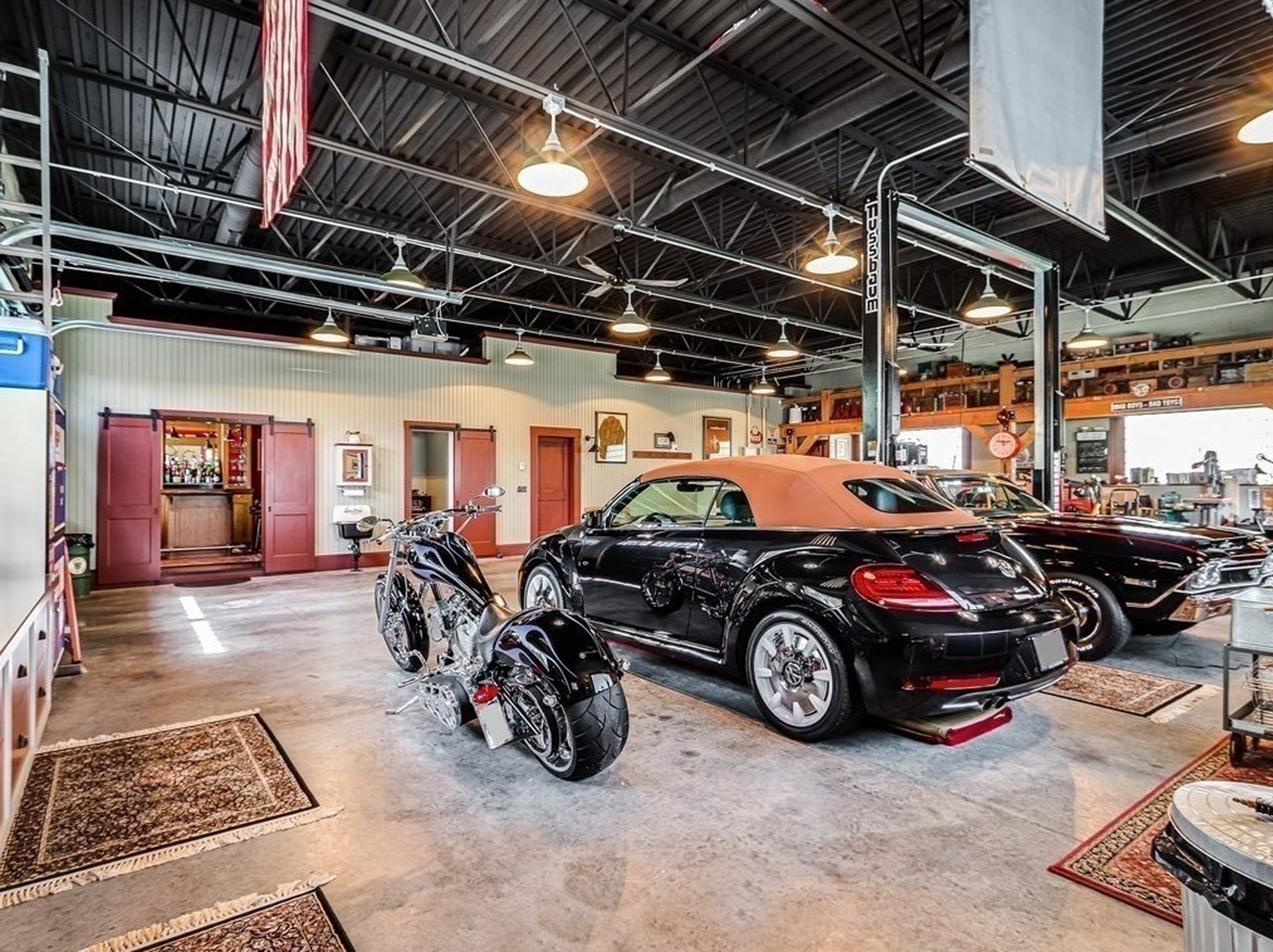 $1.45M Home Modeled After A 1930s Garage With A 2,000 Sq Ft Garage Is A Gearhead’s Dream House