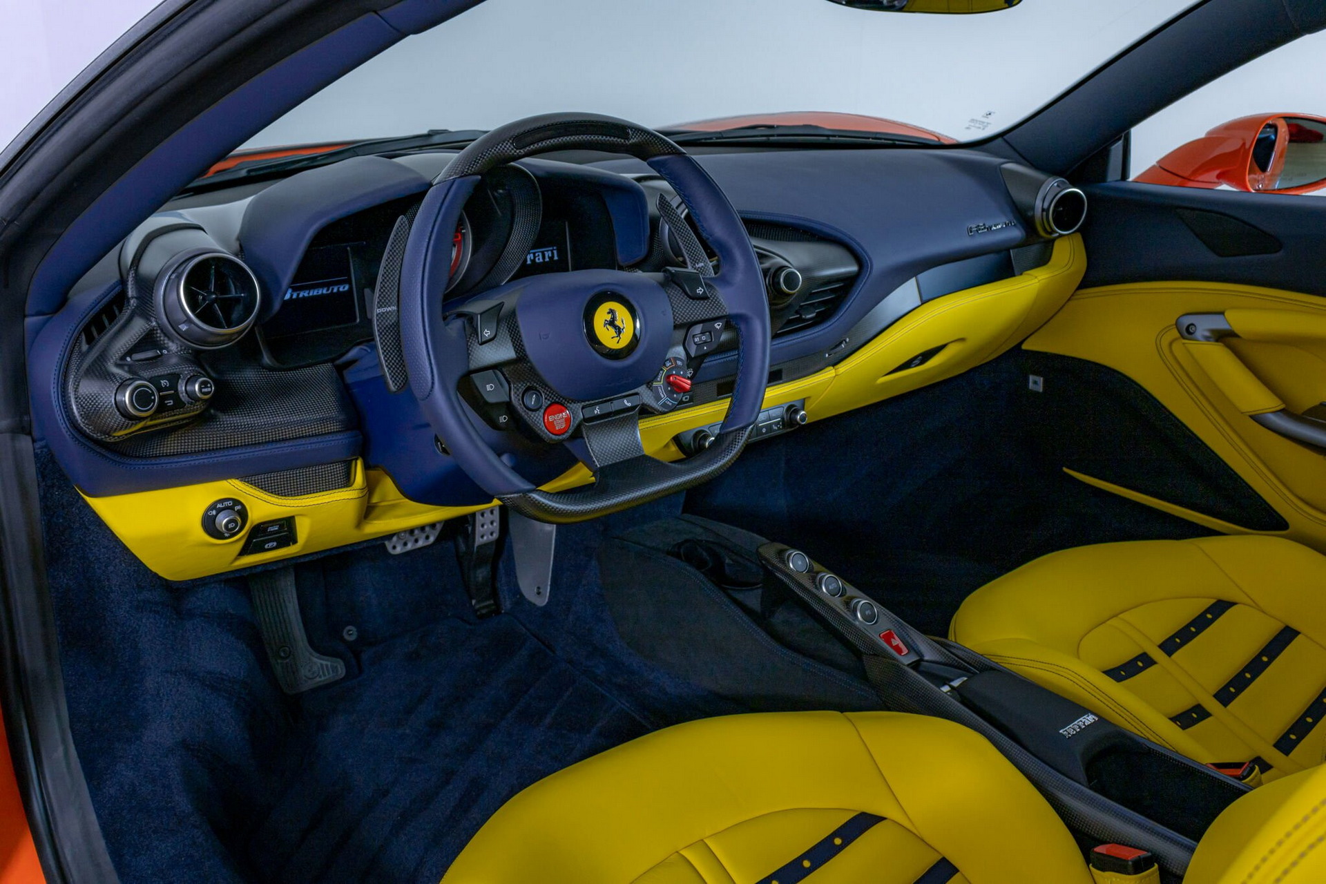 Orange Ferrari F8 Tributo With Blue And Yellow Interior Proves Money Doesn’t Always Buy Taste