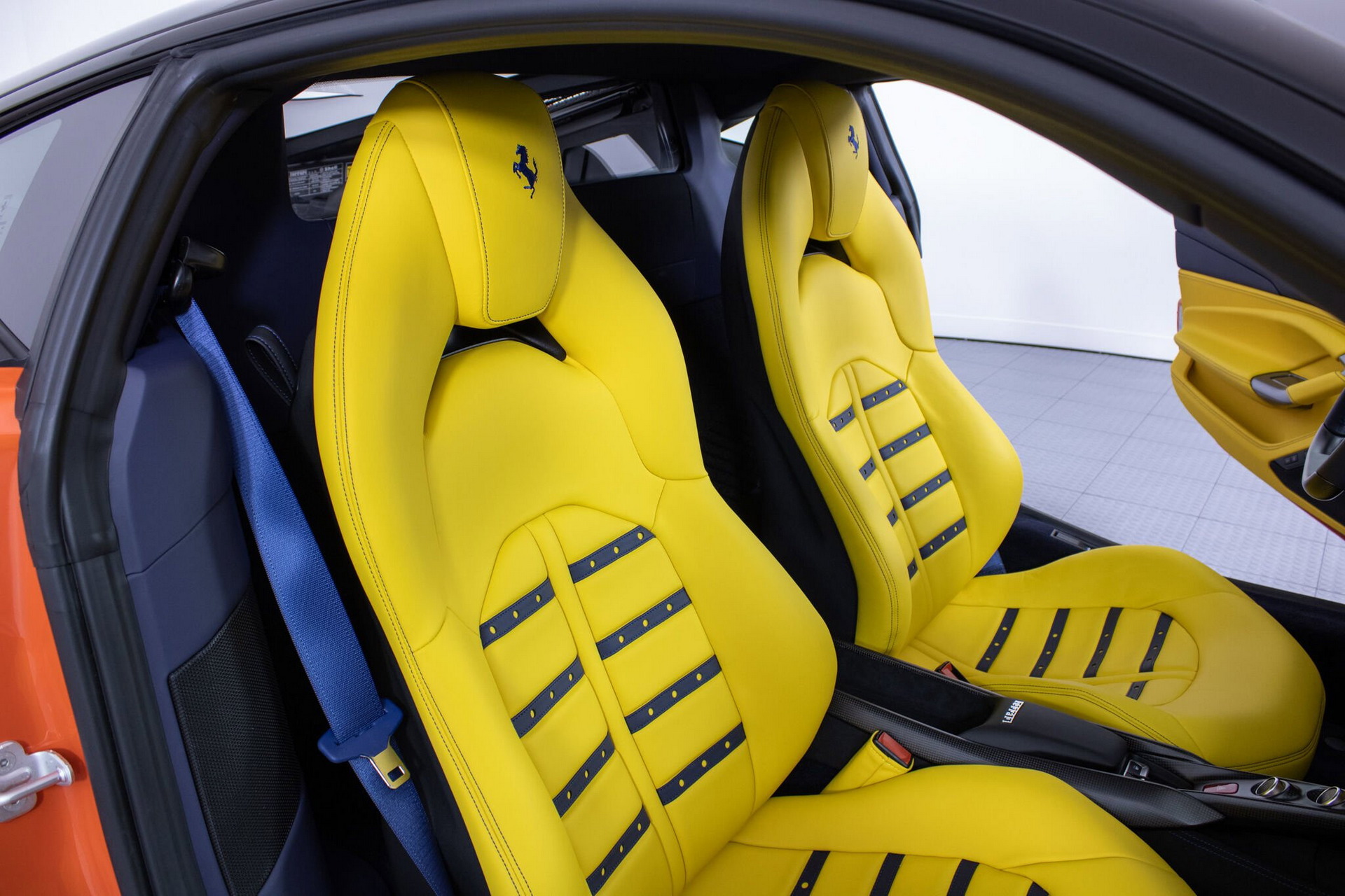 Orange Ferrari F8 Tributo With Blue And Yellow Interior Proves Money Doesn’t Always Buy Taste