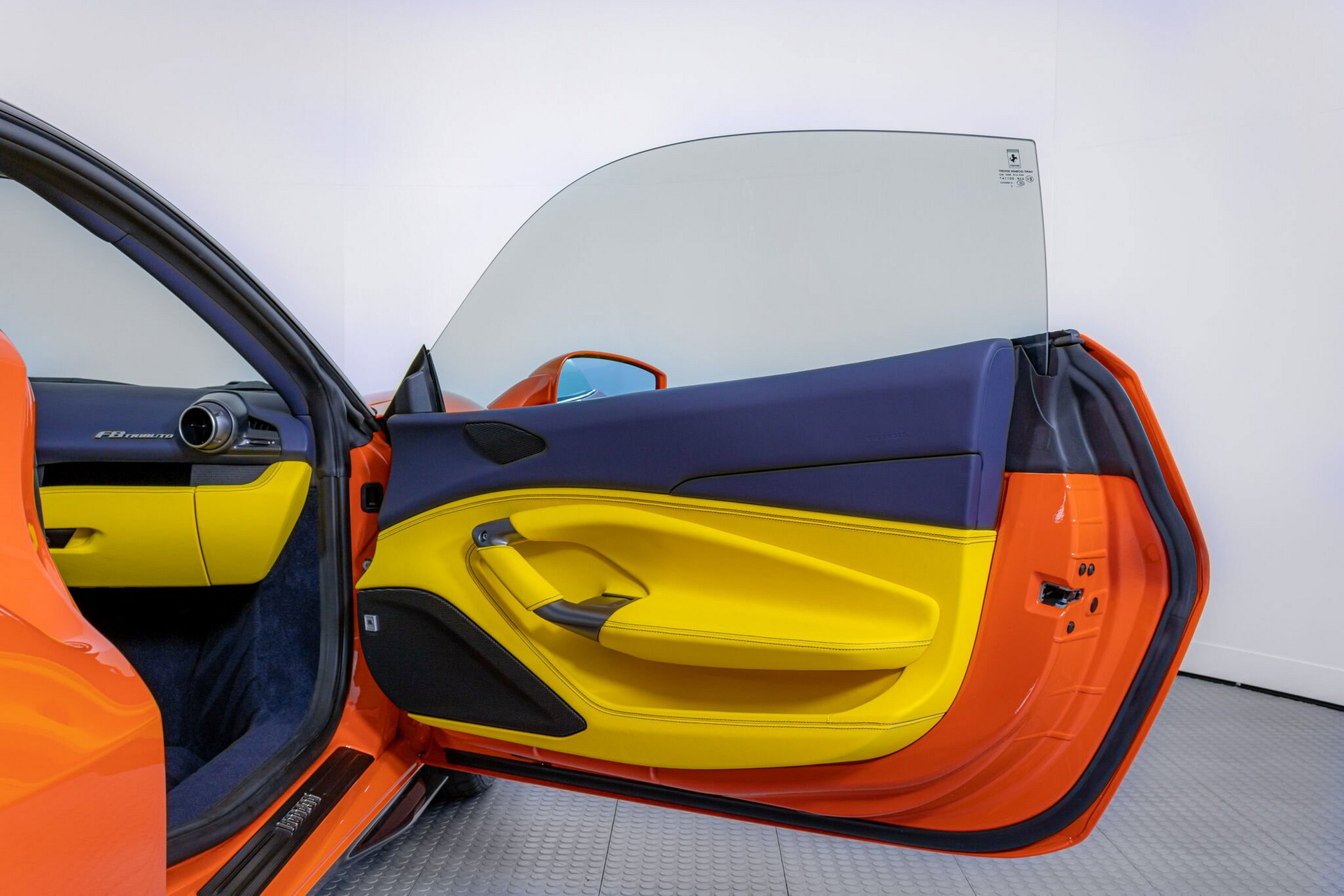 Orange Ferrari F8 Tributo With Blue And Yellow Interior Proves Money Doesn’t Always Buy Taste
