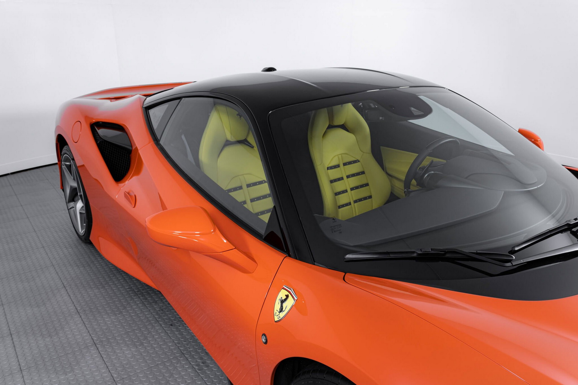 Orange Ferrari F8 Tributo With Blue And Yellow Interior Proves Money Doesn’t Always Buy Taste