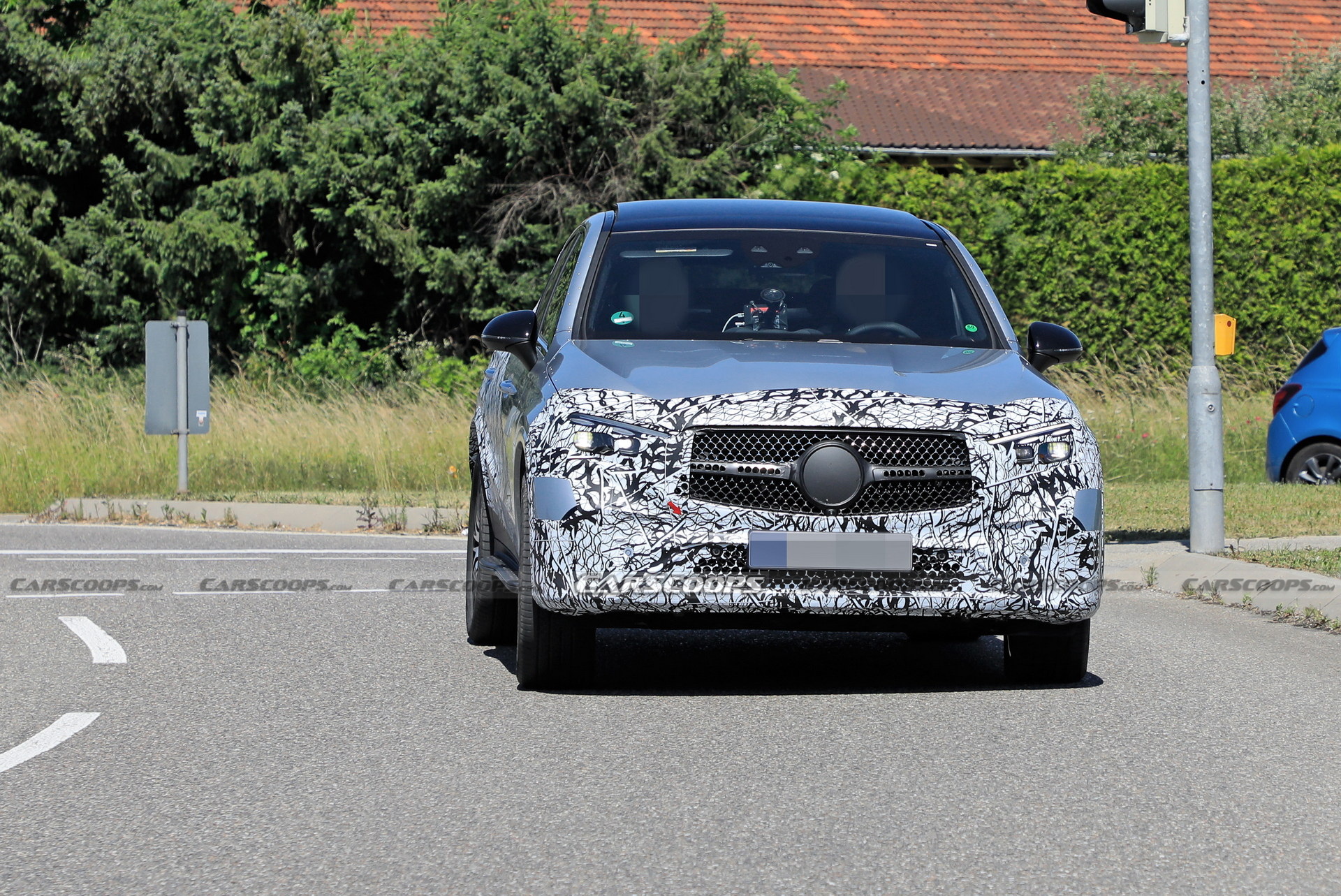 Style-Driven 2024 Mercedes-Benz GLC Coupe Spied Flaunting Its Sloping Roofline