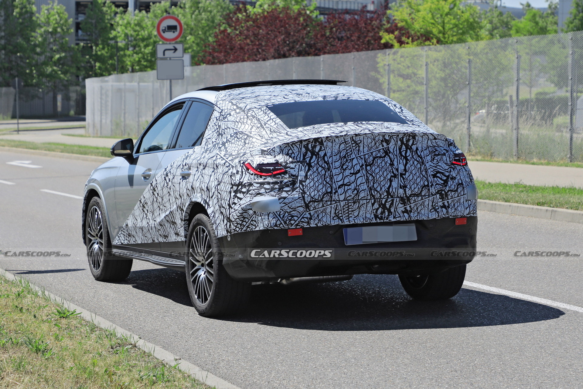 Style-Driven 2024 Mercedes-Benz GLC Coupe Spied Flaunting Its Sloping Roofline