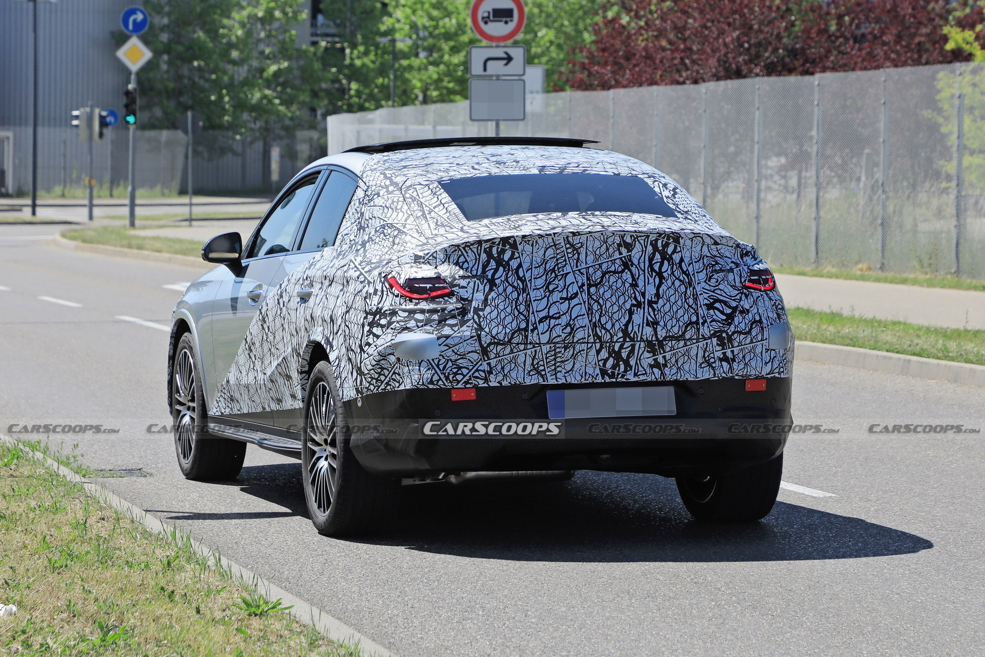 Style-Driven 2024 Mercedes-Benz GLC Coupe Spied Flaunting Its Sloping Roofline