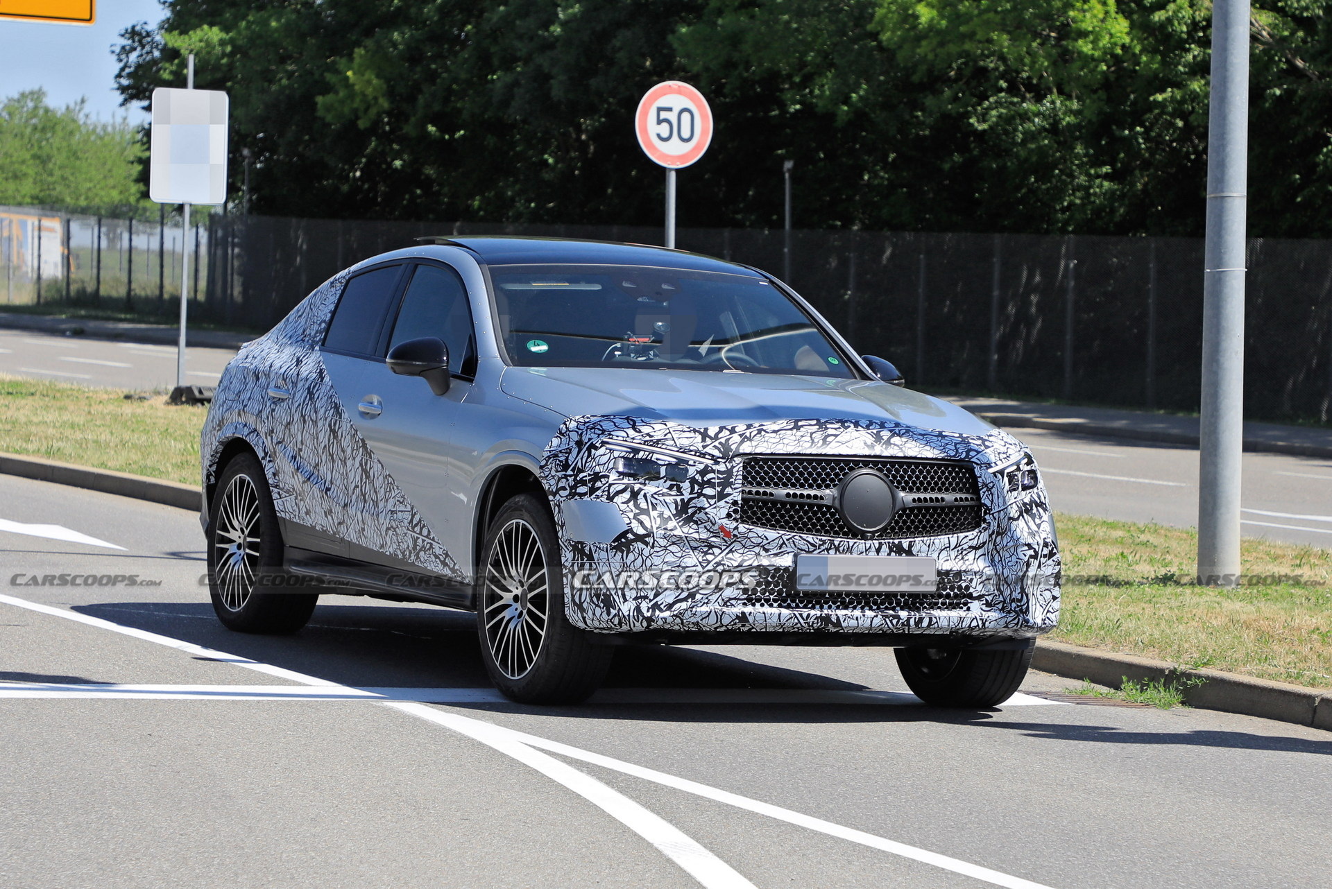 Style-Driven 2024 Mercedes-Benz GLC Coupe Spied Flaunting Its Sloping Roofline