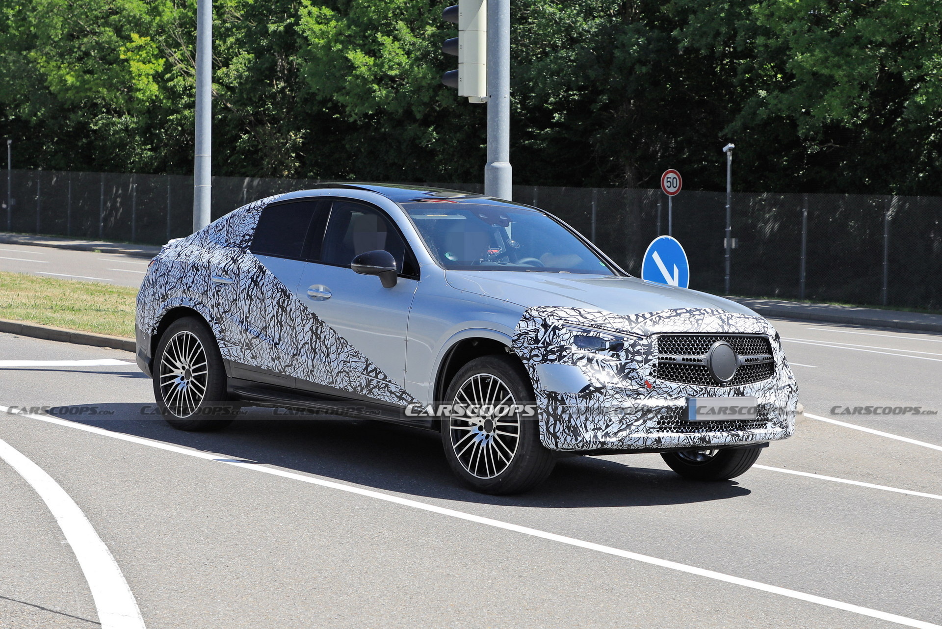 Style-Driven 2024 Mercedes-Benz GLC Coupe Spied Flaunting Its Sloping Roofline