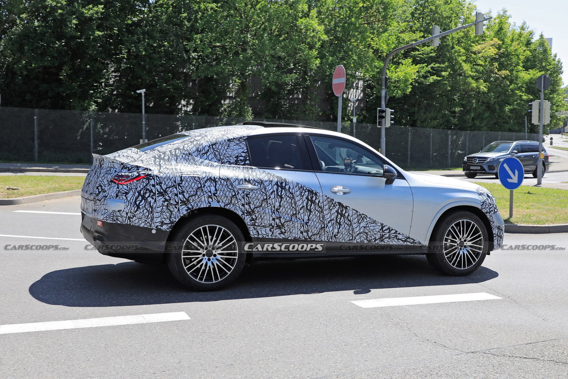 Style-Driven 2024 Mercedes-Benz GLC Coupe Spied Flaunting Its Sloping Roofline