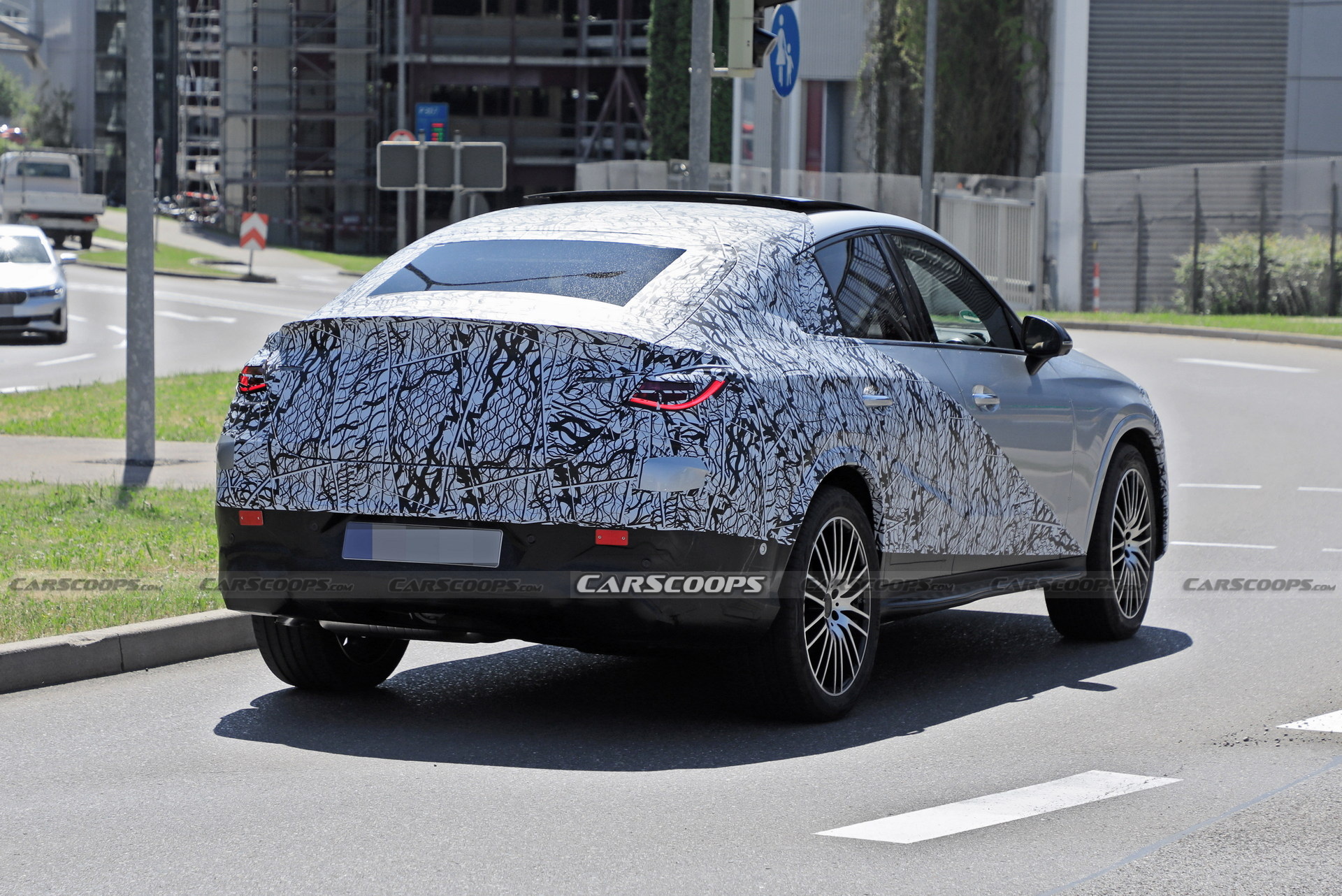 Style-Driven 2024 Mercedes-Benz GLC Coupe Spied Flaunting Its Sloping Roofline