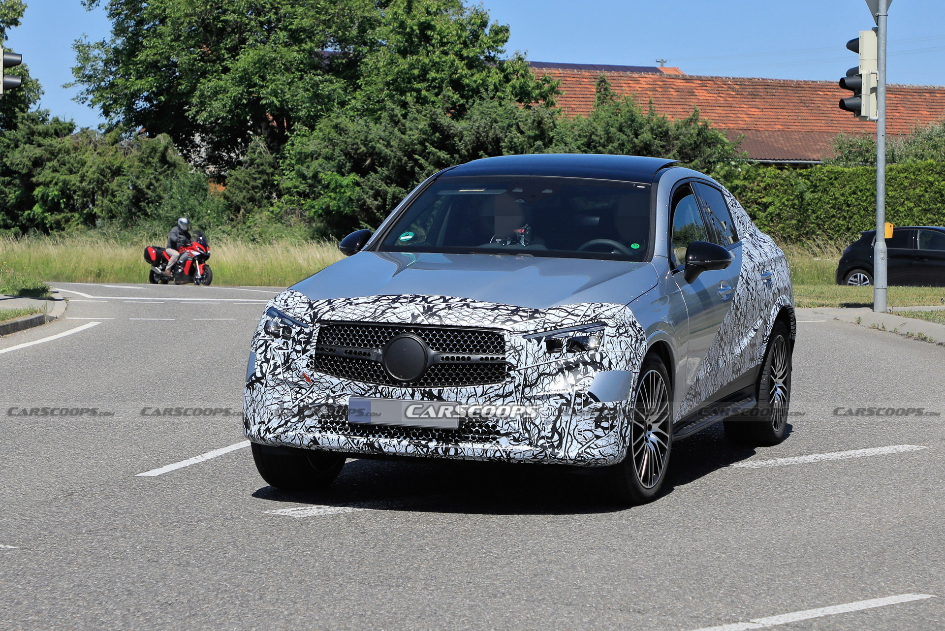 Style-Driven 2024 Mercedes-Benz GLC Coupe Spied Flaunting Its Sloping Roofline